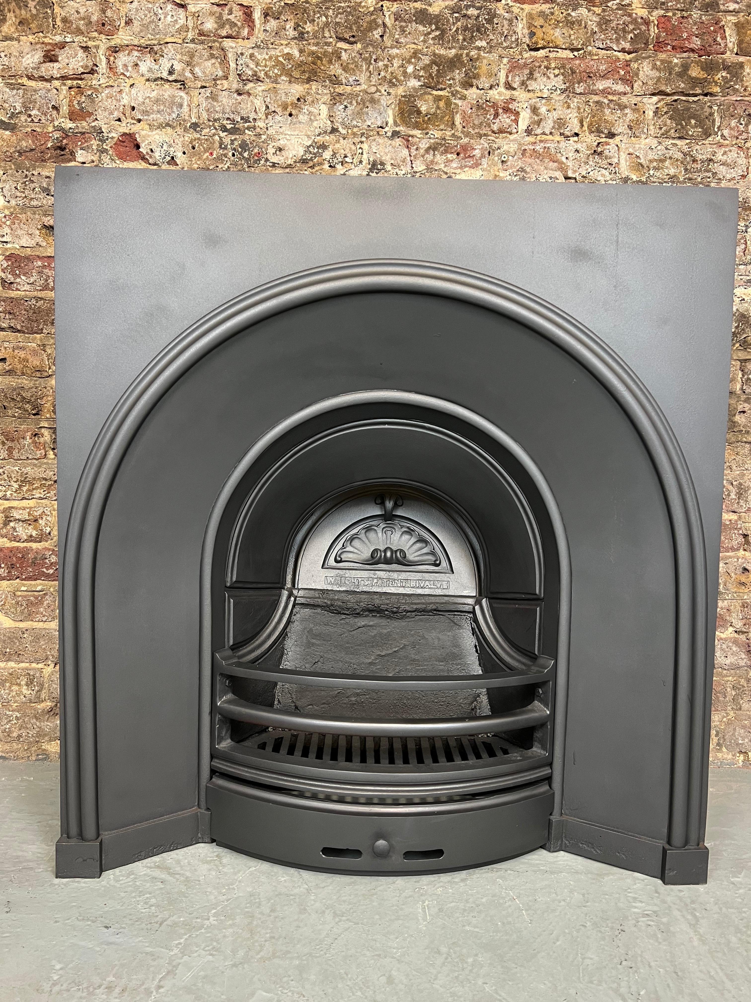 cast iron arched fireplace insert