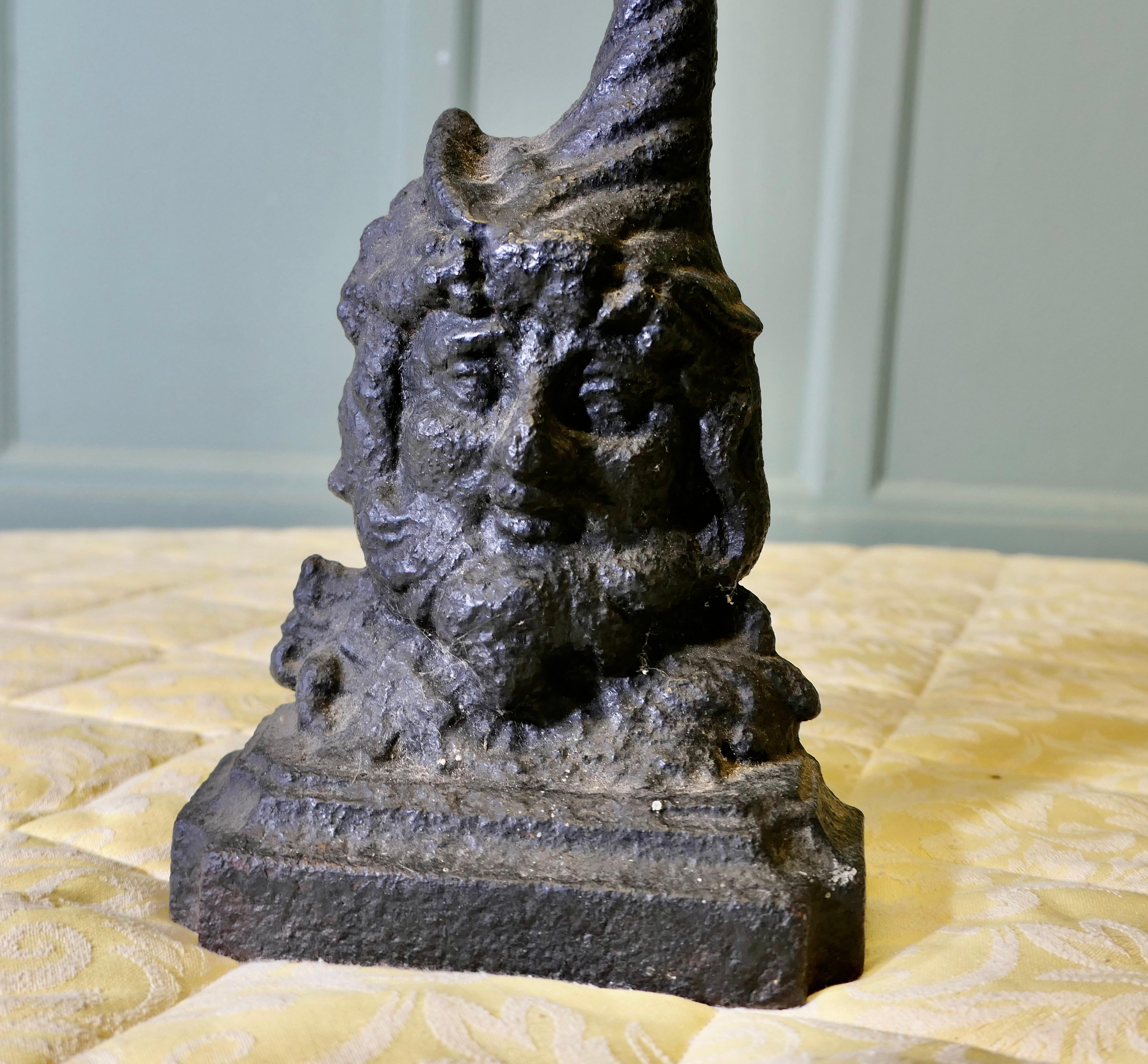 Folk Art 19th Century Cast Iron Bacchus Doorstop For Sale