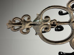 19th-century cast-iron coat rack