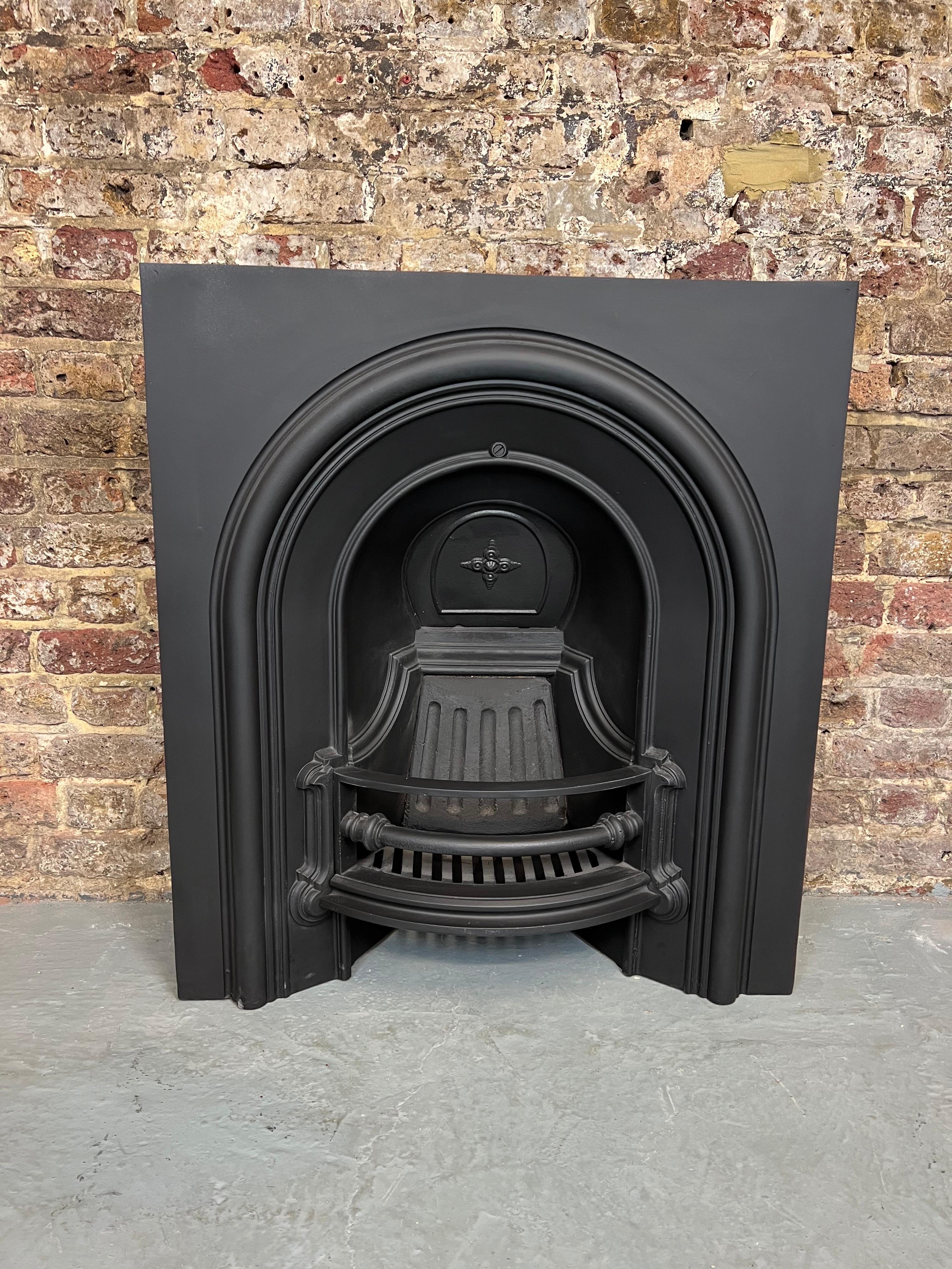 19th Century Cast Iron Fireplace Insert
English Made Circa 1880 From The Victorian Period.
This Classic Arched Fireplace Insert Is Complete With Back & Front Bars.
In Traditional Blackened Finish. Recently Salvaged From A Period London Victorian