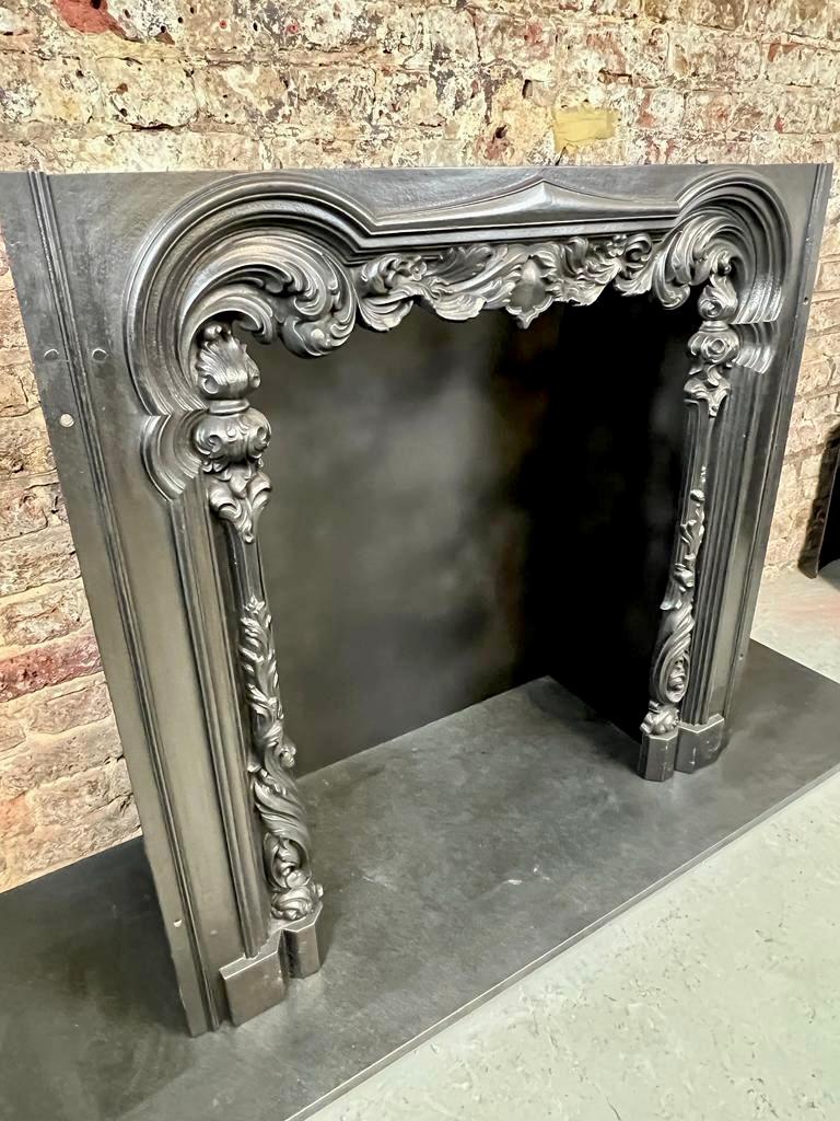 19th Century Cast Iron Fireplace Insert.
William IV To Early Victorian Period. Dated Circa 1830 - 1840
Original Cast Iron Front Fireplace Facisa Insert. In Traditional Blackened (Black Lead) Finish. 
English Made With Beautiful Scrolleld Floral