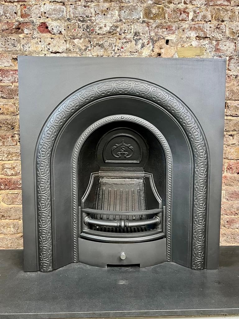 19th Century Cast-Iron Fireplace Insert.
English made dated circa 1880. 
Recently Slavaged & blackened to its former glory.
Typical arched fireplace insert for its period. 
Original insert, damper flap, front bars and firebick.
We have included an