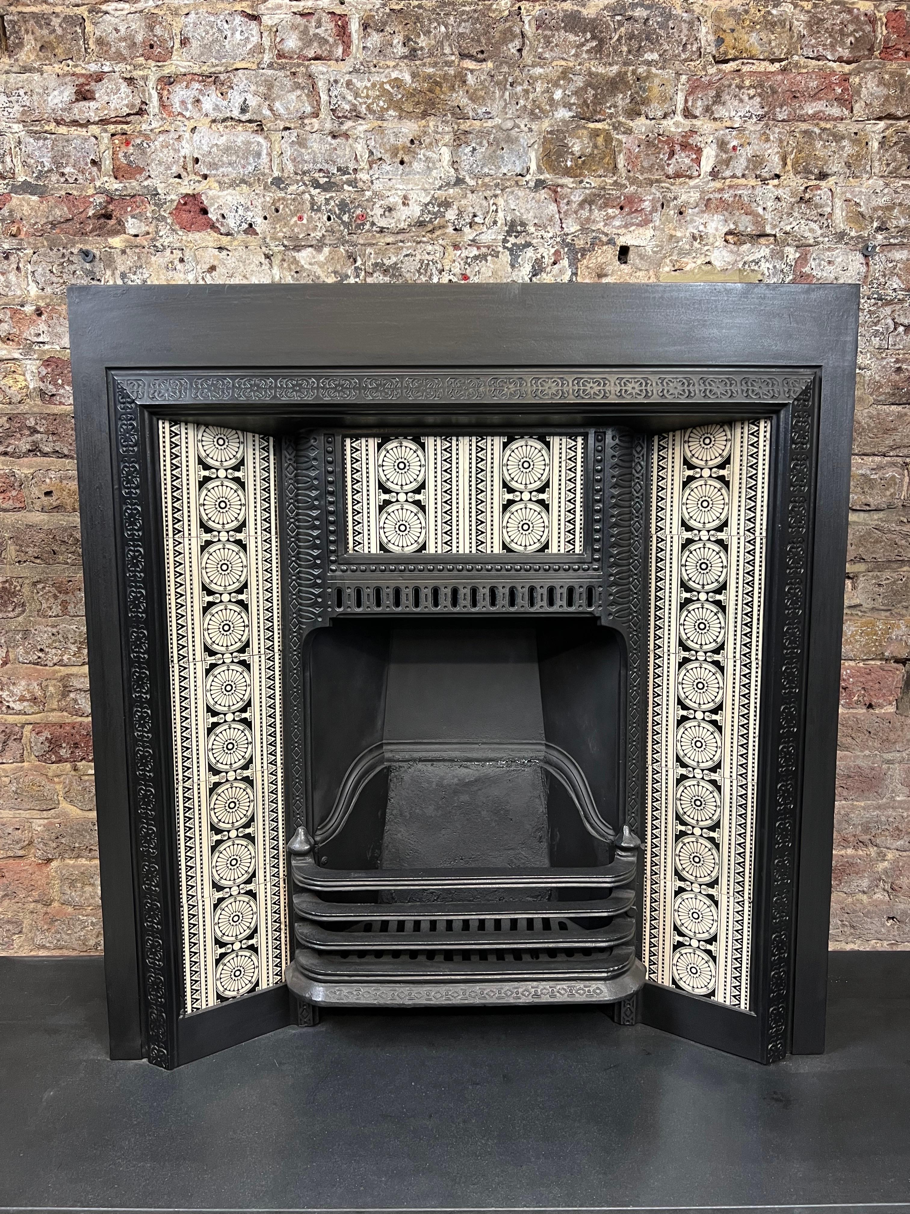 19th Century Cast-iron Fireplace Insert With Minton Tiles.
A Very Fine & Rare Example Of Such Quality. Perfectly Depicting A True Reflection Of Quality Craftsmanship During The Victorian Period. 
This Excellent Fireplace Recently Salvaged From A