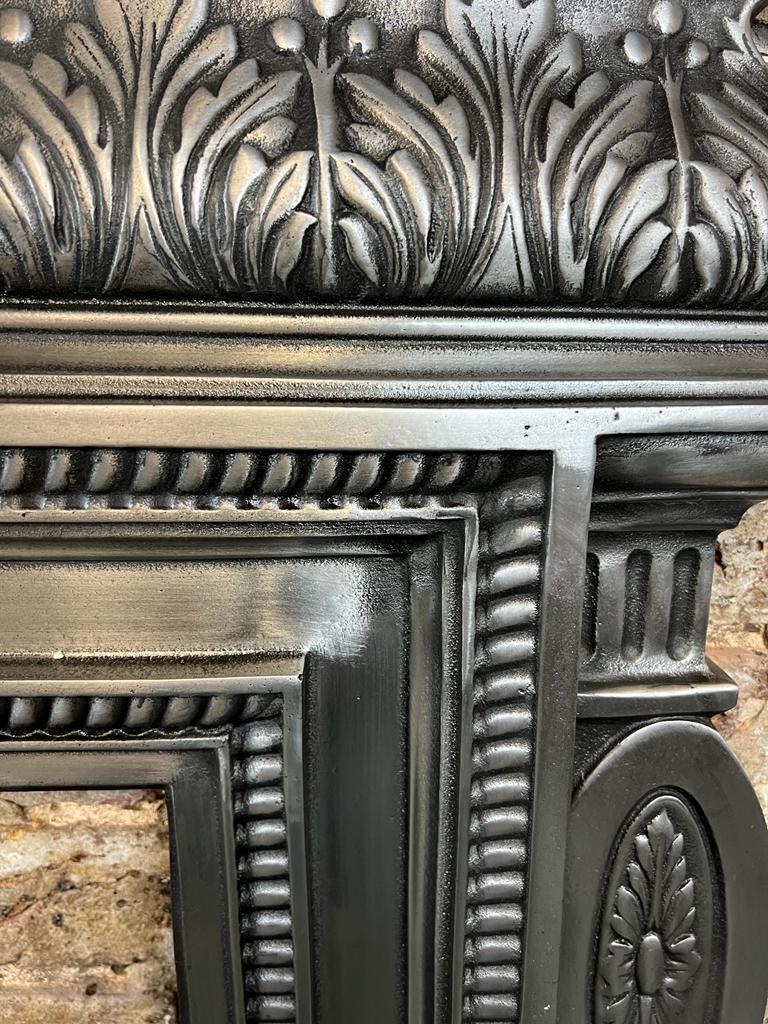 19th century cast iron fireplace mantlepiece.
Recently Salvaged from a London Town house and fully restored in a traditional beautiful burnished finish.

Dimensions:
Shelf width 62 inches
Shelf depth 8 inches
Overall height 50 inches
Opening
