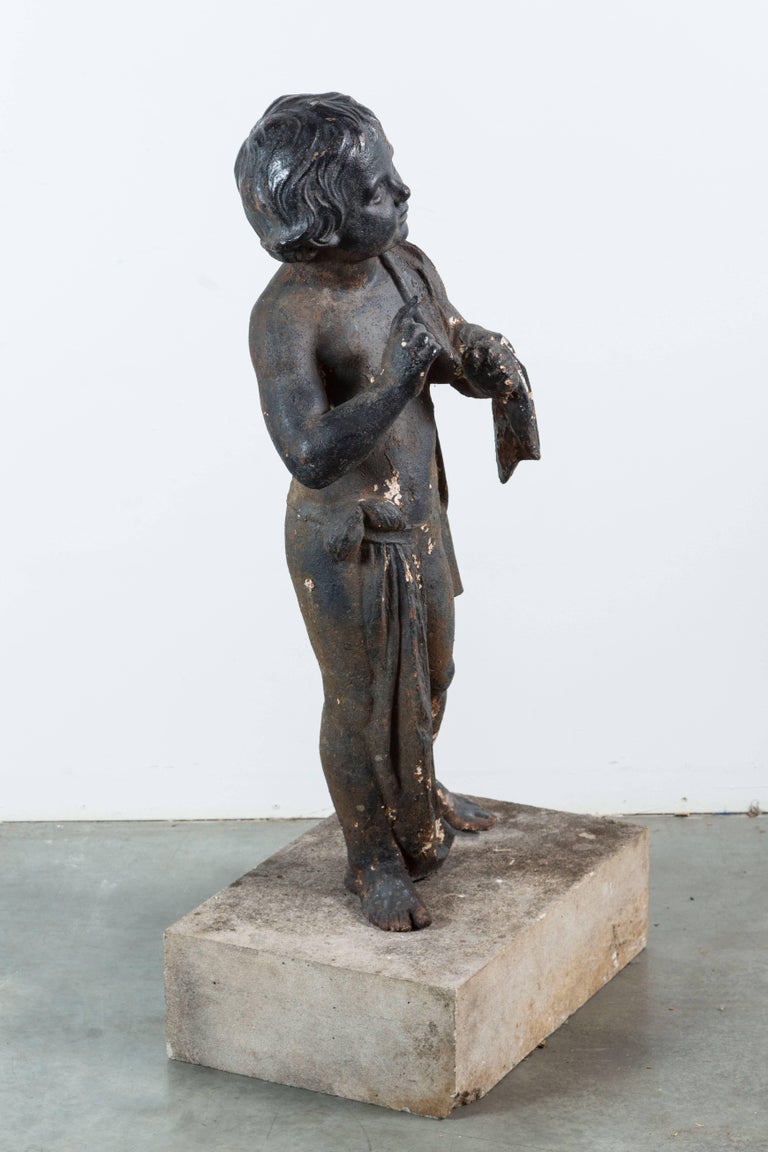19th Century Cast Iron Fiske Cherub Boy Garden Statue For Sale at 1stDibs