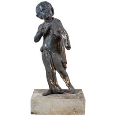 19th Century Cast Iron Fiske Cherub Boy Garden Statue