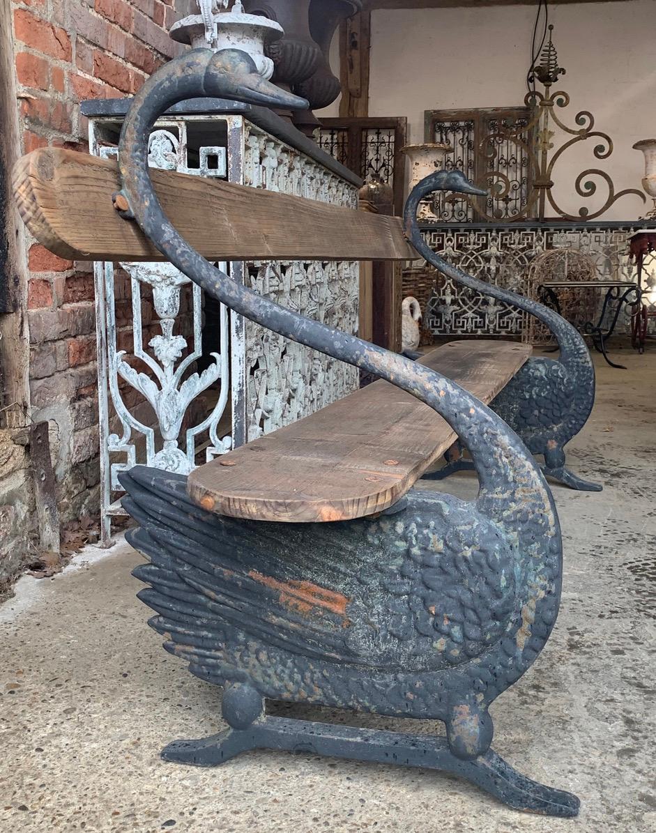 A wonderful French 19th century heavy cast iron and wood garden seat with a pair of beautiful black Swans. Very nice quality and in good solid condition.
The wood has been replaced at some point as you would expect for age and being outside. Ready