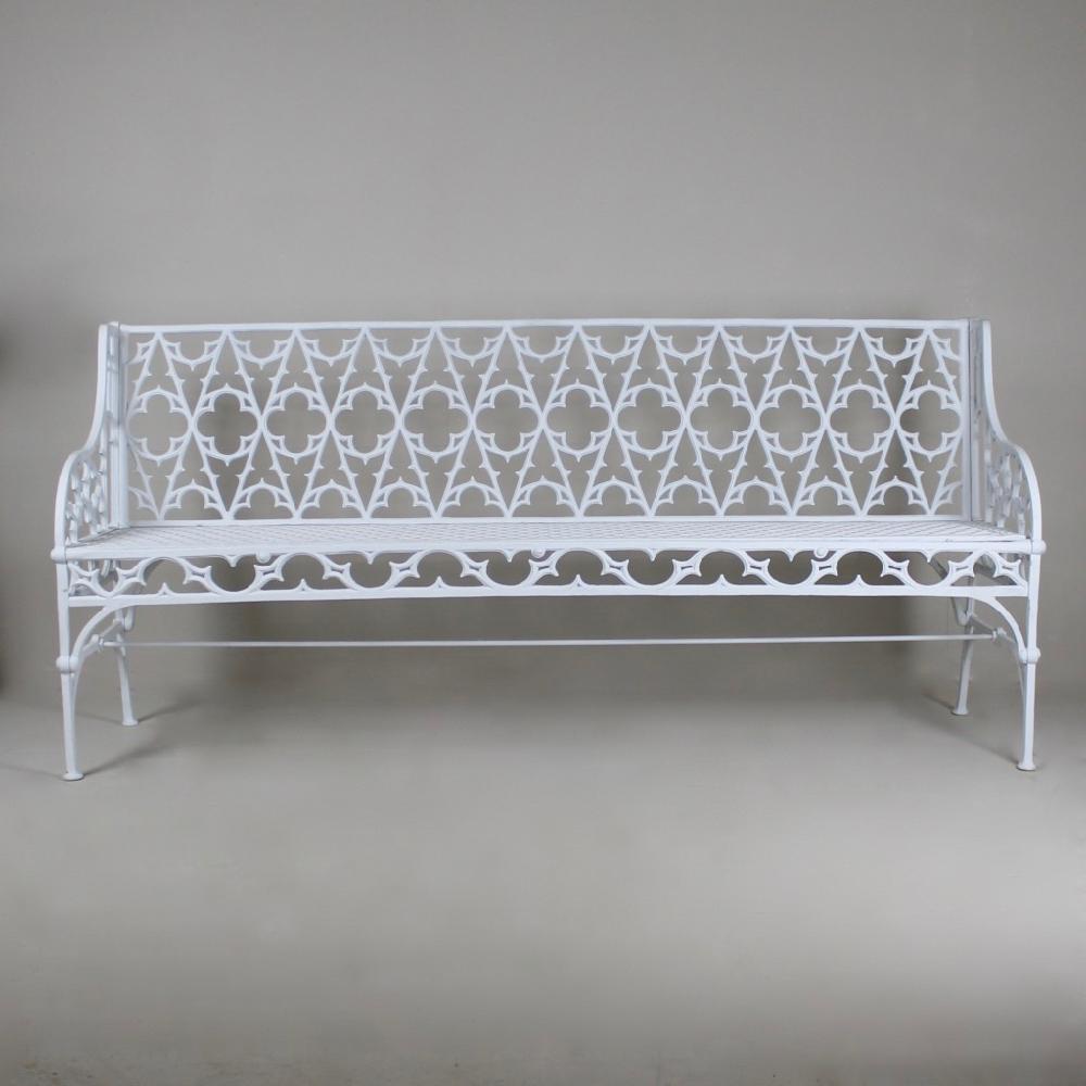 A large scale, 19th century gothic cast iron garden bench, by the renowned French foundry Val D'osne. In excellent condition, beautifully crisp casting, the whole primed and ready for its top coat of paint.

French, circa 1880.
