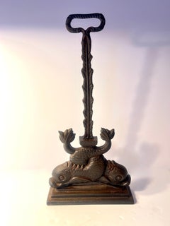 19th Century Cast Iron Intertwined Dolphins Door Stop