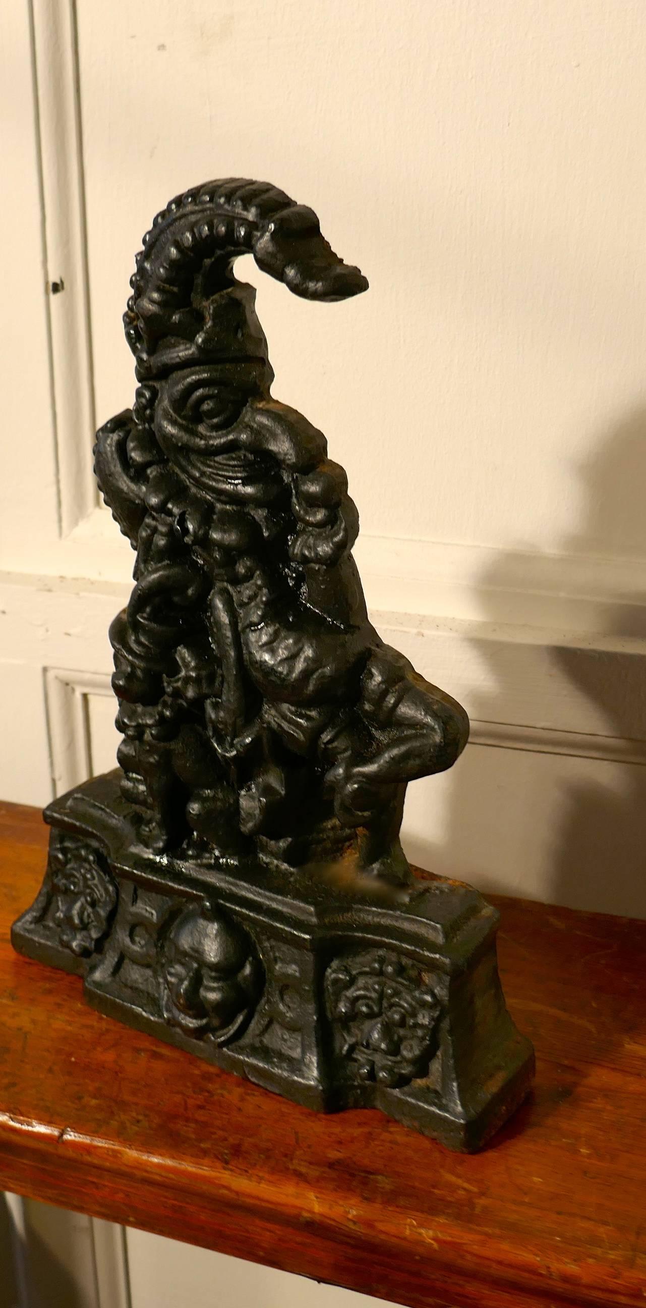 Expressionist 19th Century Cast Iron Mr Punch Door Stop For Sale