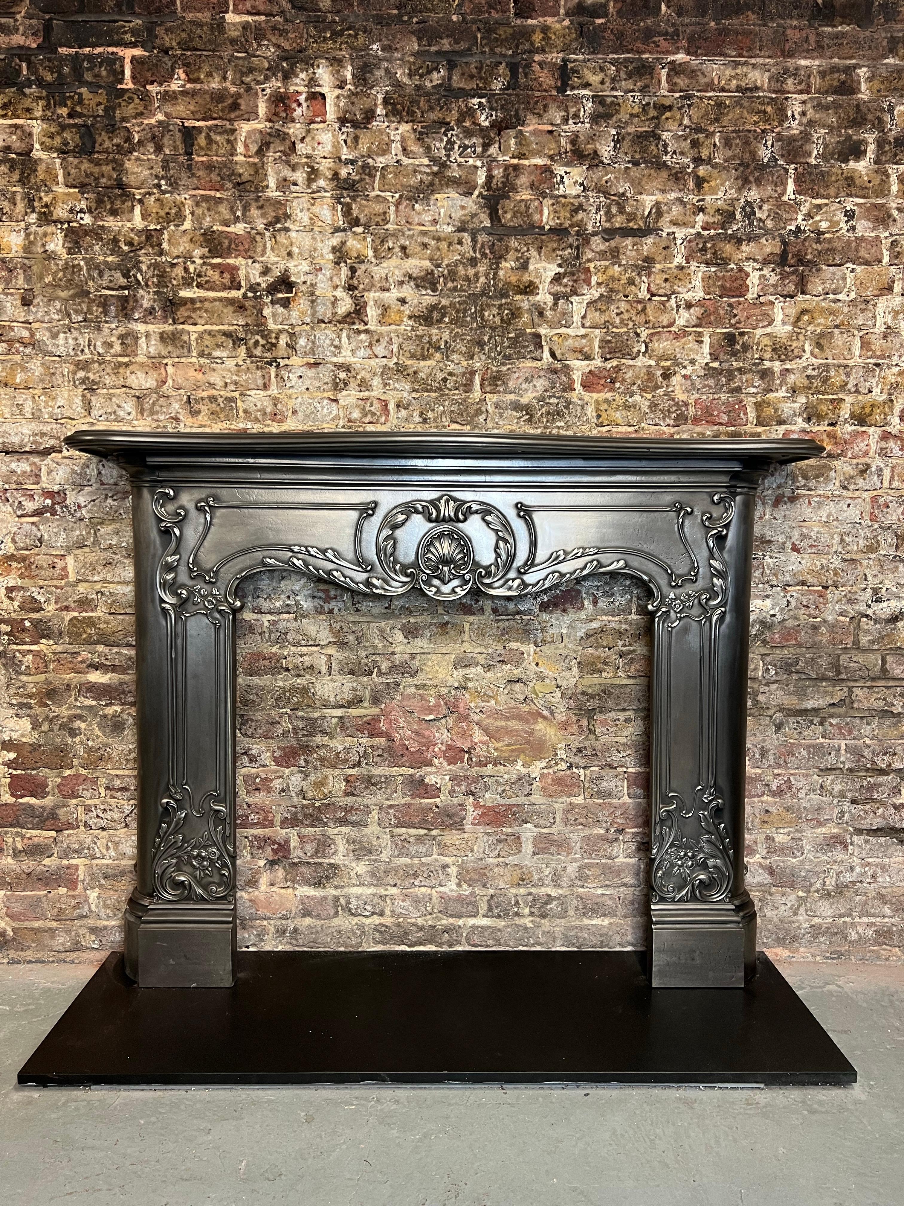 19th Century Cast Iron Serpentine Burnished Fireplace Mantlepiece.
Recently Salvaged From A London Town House. 
This Stunning Origional And Rare Victorian Antique Mantlepiece Surround, Dated Circa 1880 And Offered in Very Fine Condition.
French