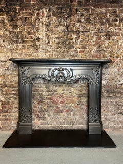 19th Century Cast Iron Serpentine Burnished Fireplace Mantlepiece