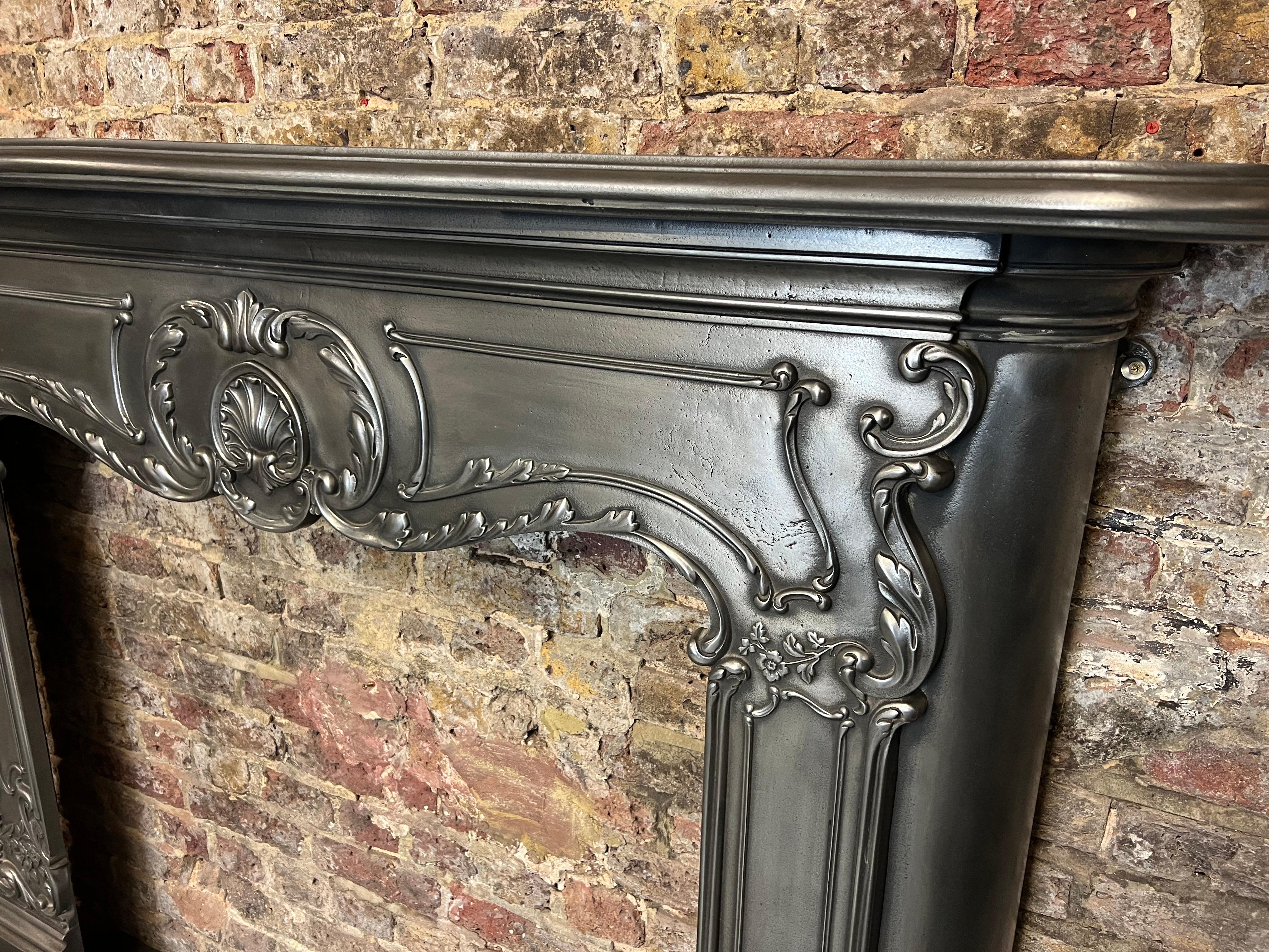 Victorian 19th Century Cast Iron Serpentine Burnished Fireplace Mantlepiece For Sale