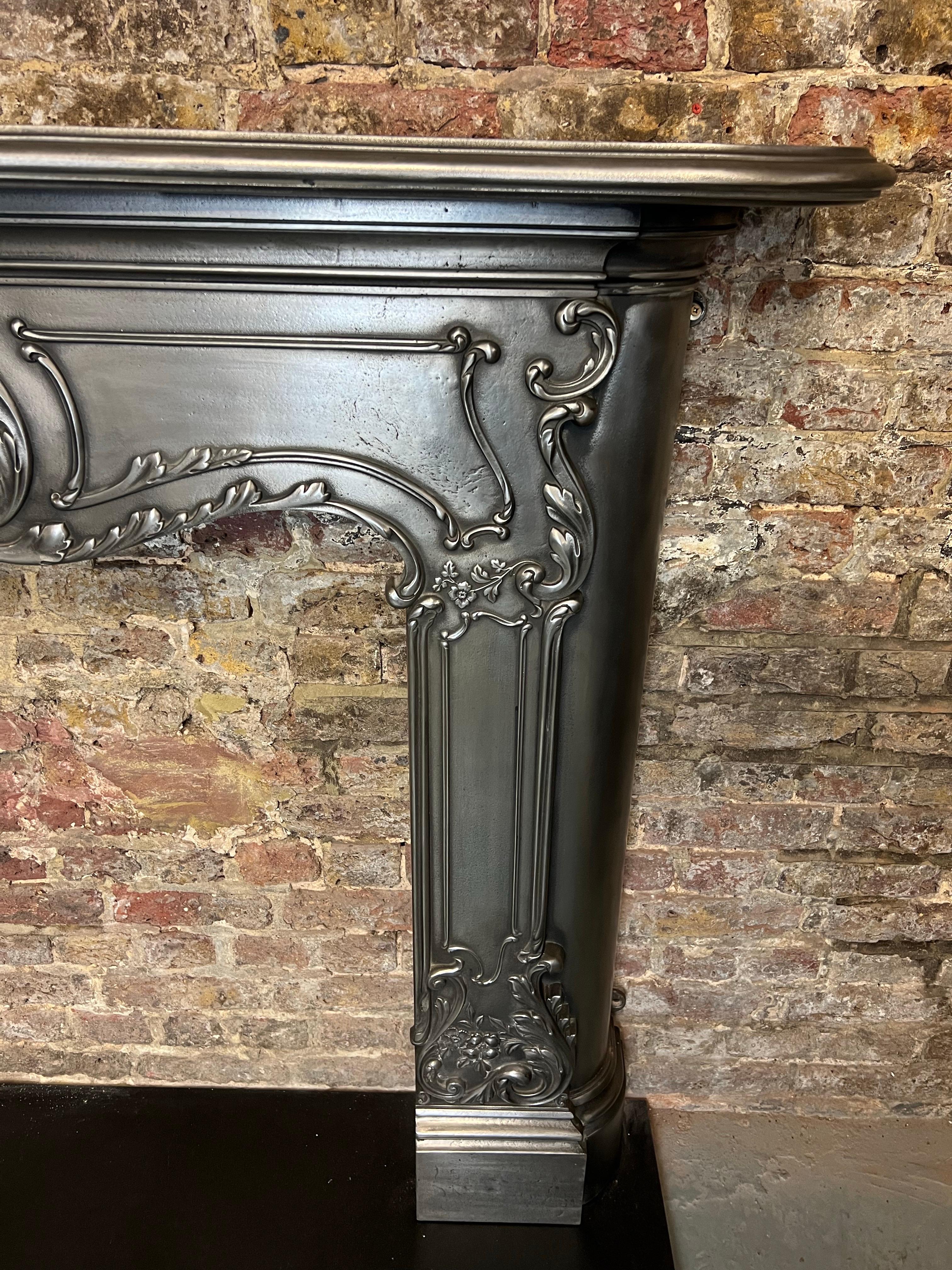European 19th Century Cast Iron Serpentine Burnished Fireplace Mantlepiece For Sale