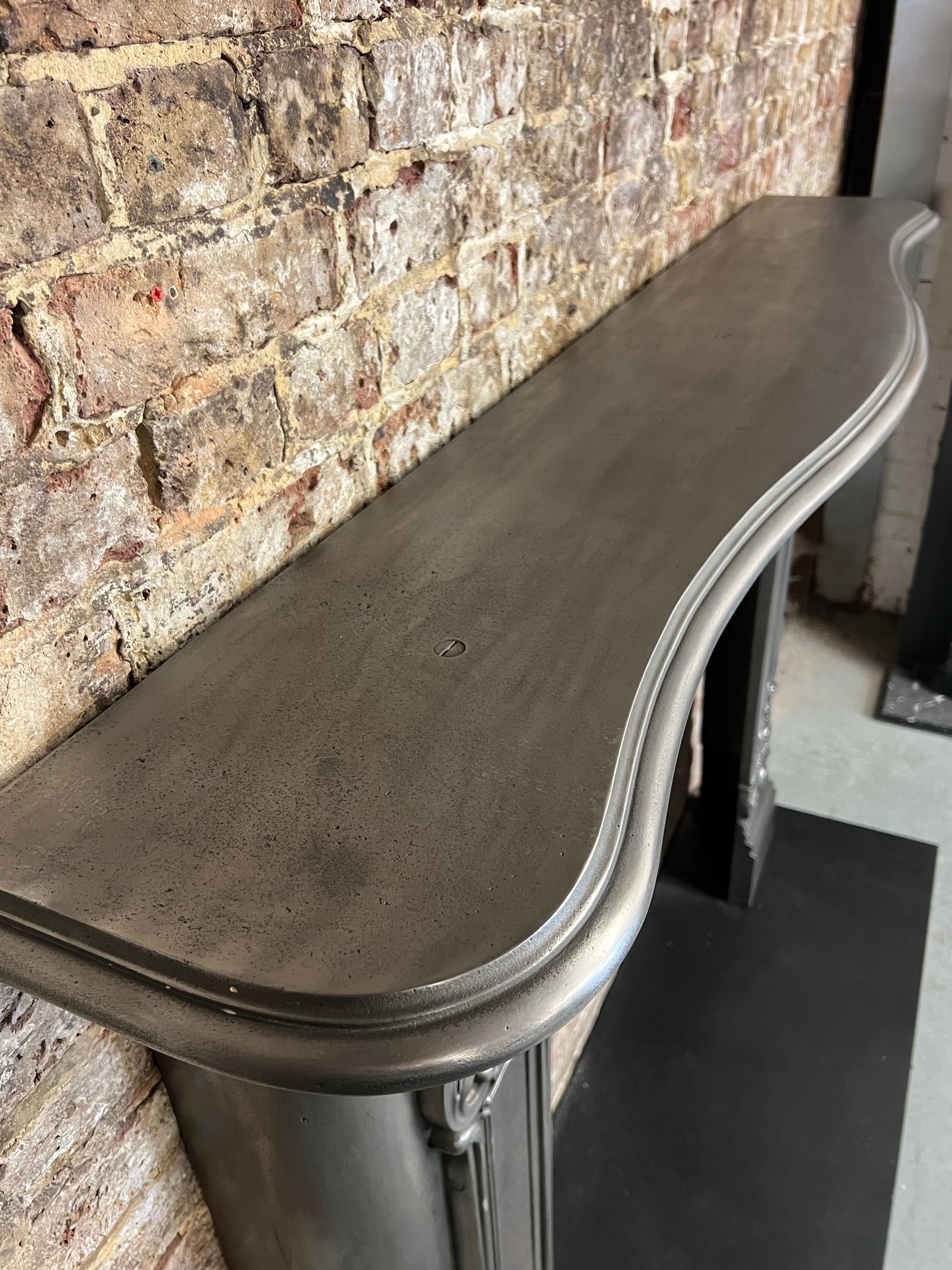 19th Century Cast Iron Serpentine Burnished Fireplace Mantlepiece For Sale 2