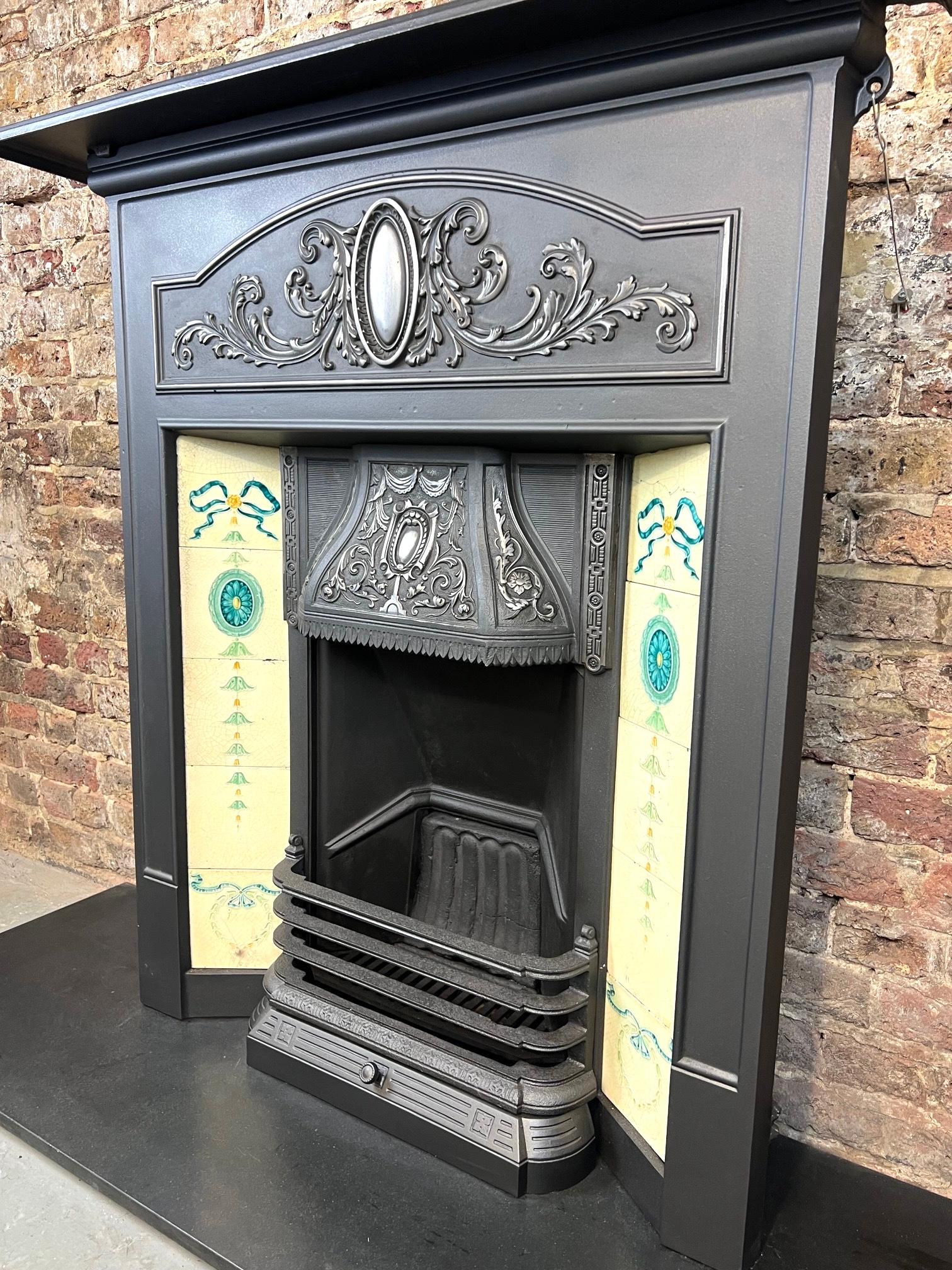 19th Century Cast-Iron Tiled Fireplace Combination.
Recently Salvaged From A London Town House.
This Beautiful English Made Fireplace Dated Circa 1880 Comes With Its Original Full Set Of Embossed Tiles Flanked Each Side, 
With Front Bars And