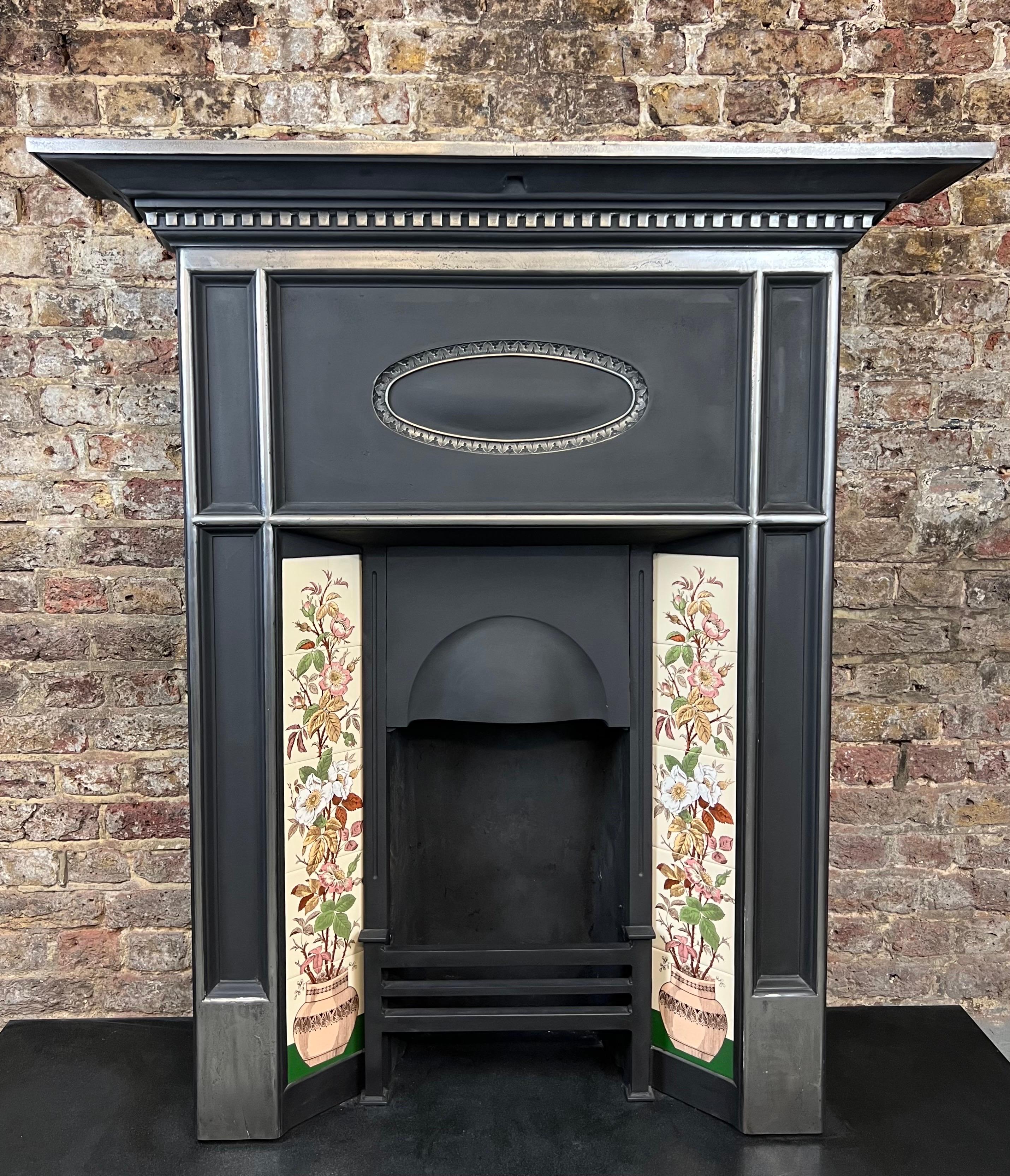 19th century cast iron tiled fireplace combination fireplace.
Late Victorian fireplace complete with canopy, front bars, hood in a
highlight burnished finish. Included is a full set of 10 English wild rose tiles. (5 on each side) recently salvaged