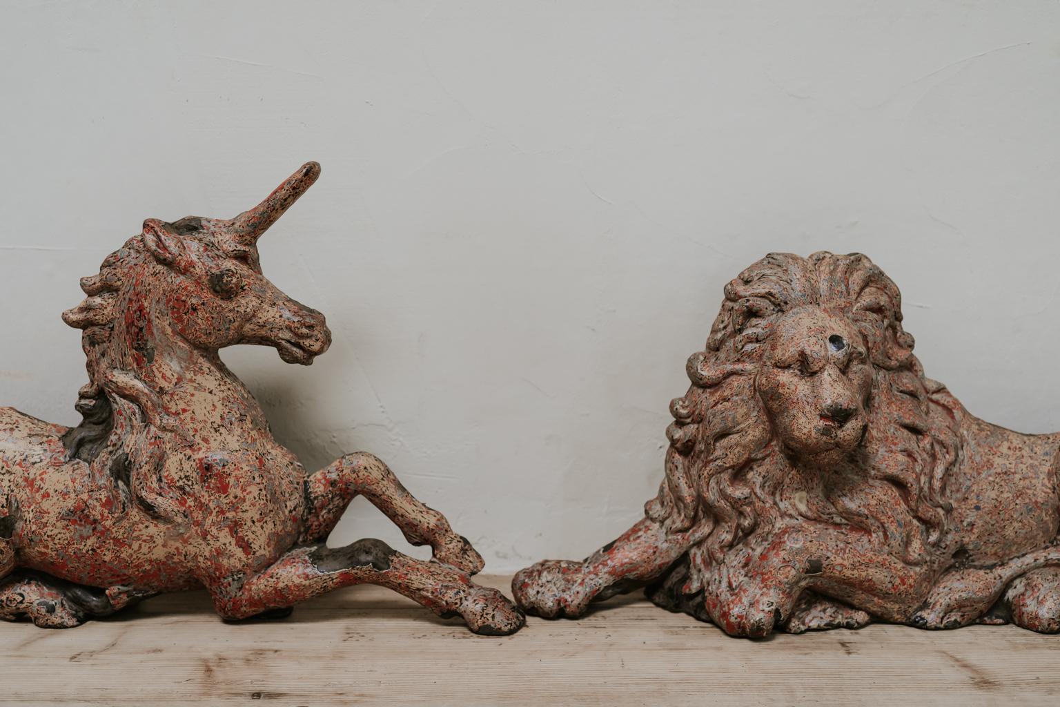 Great decorative objects, wonderful patina, the unicorn and lion are the Arms of Dominion, the Royal Coat of Arms from the United Kingdom 
Dimensions are lion : 70 cm wide x 40 cm high and 10 cm deep, the unicorn : 70 cm wide x 45 cm high and 10 cm