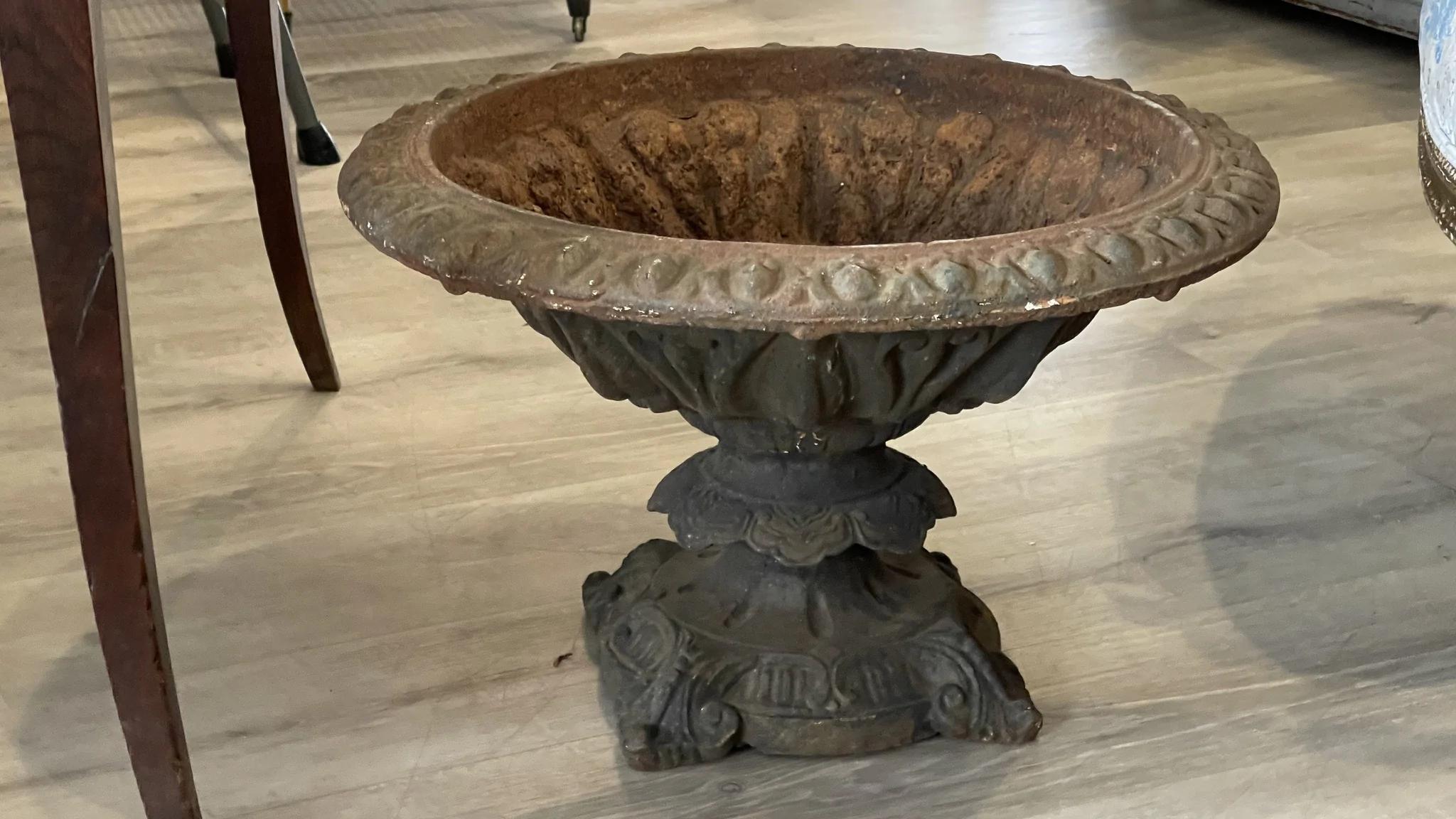 19th Century Cast iron planter urn form with fine foliate detail throughout.

