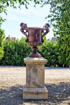 Cast Iron Vase and French Limestone Pedestal Base