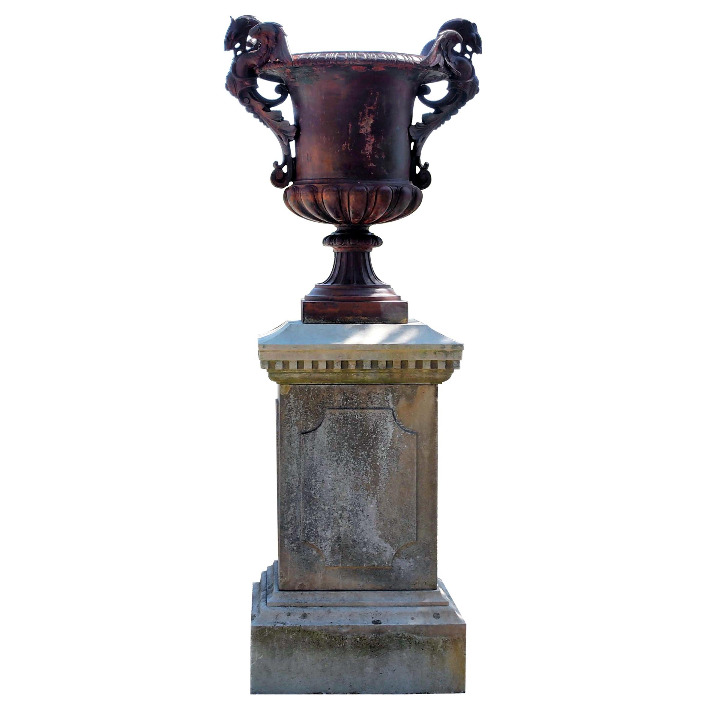 Cast Iron Vase and French Limestone Pedestal Base For Sale
