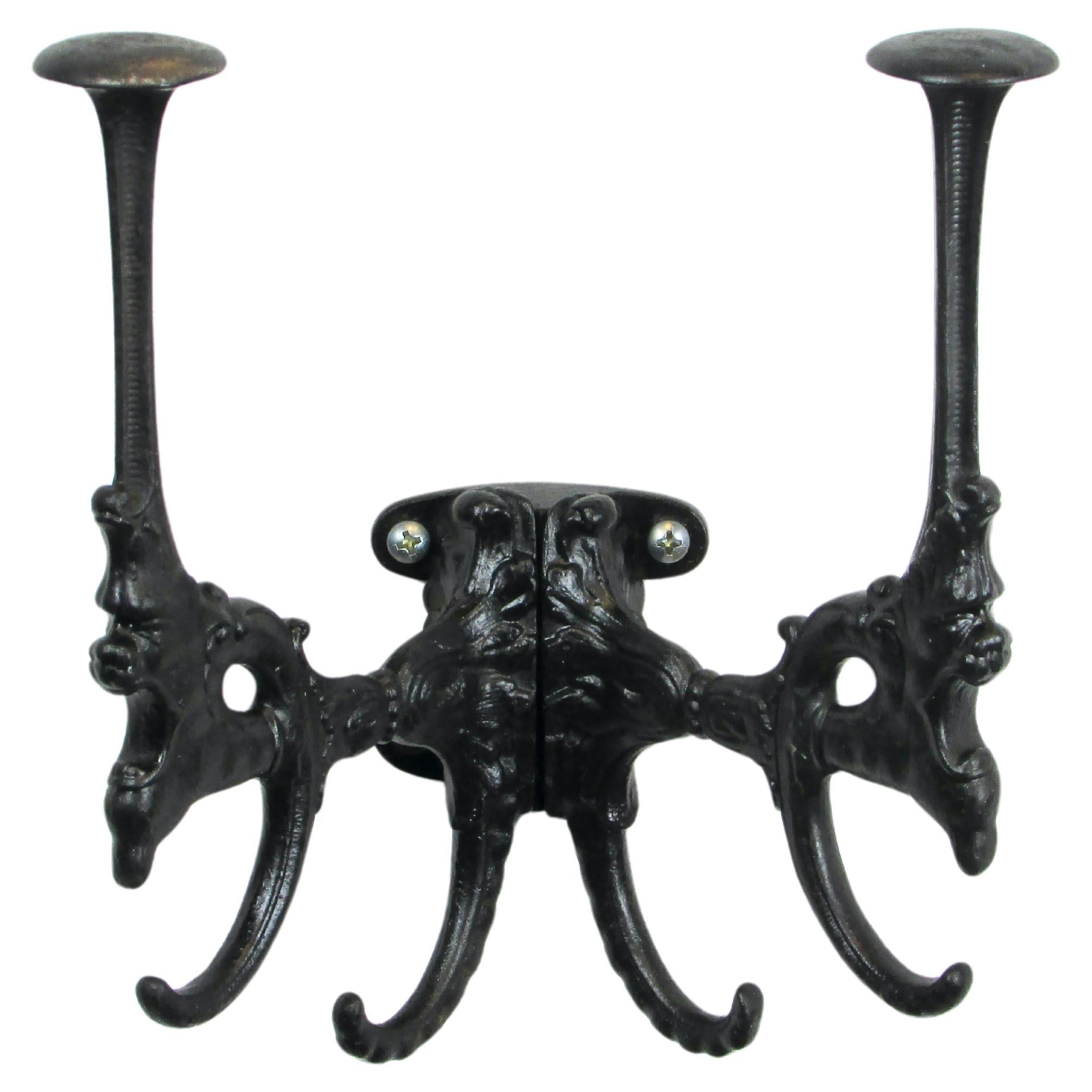 19th Century Cast Iron Wall Mounted Hat Rack With Gargoyles For Sale