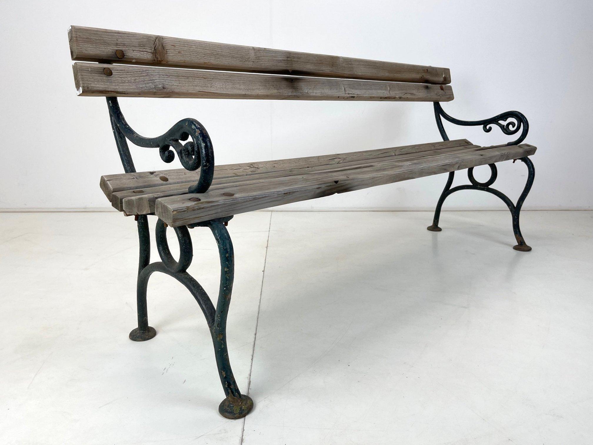 Beautiful antique cast iron bench from Eastern Europe in original condition with original patina.