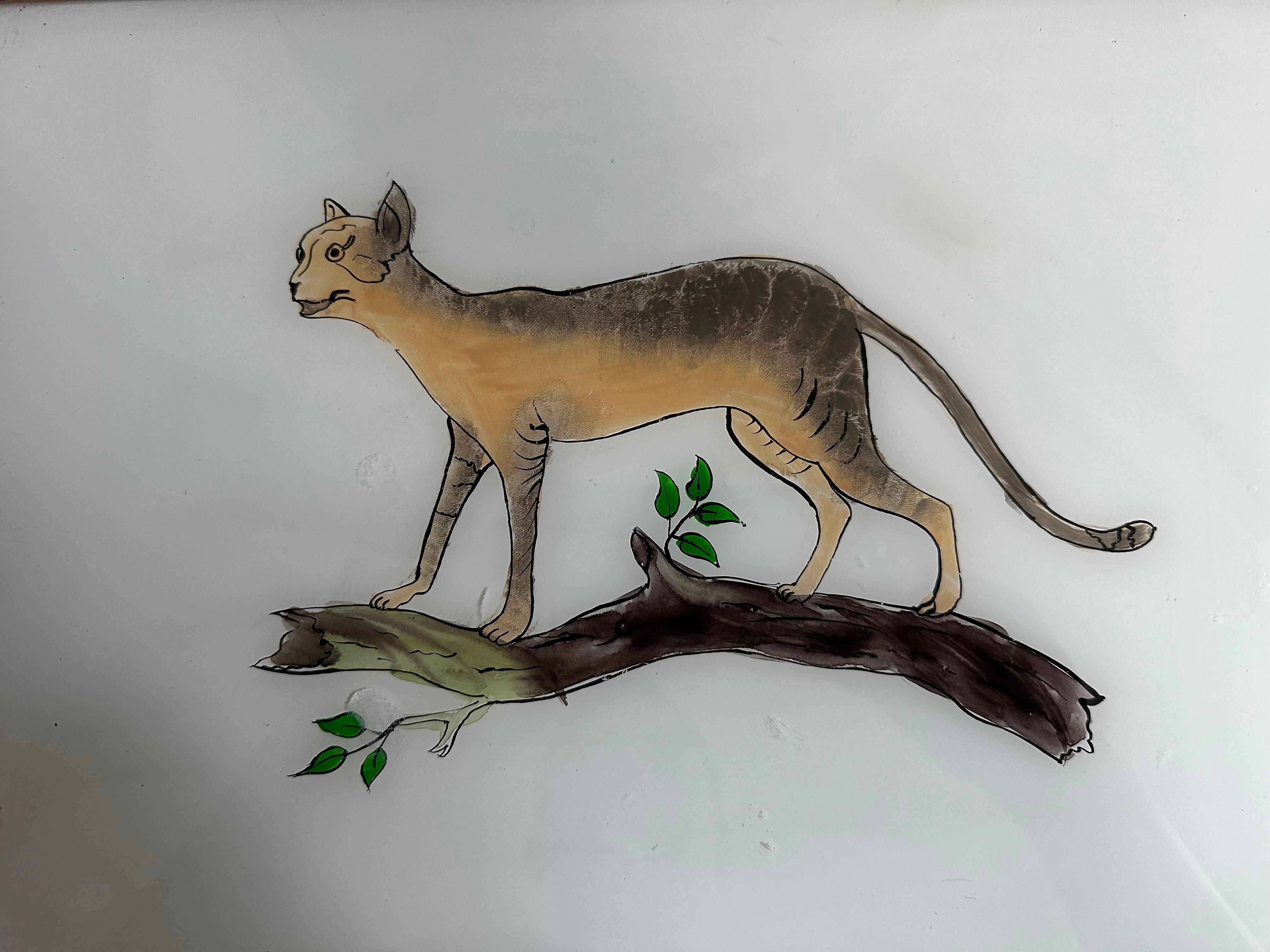 Ce gracieux portrait de chat du XIXe siècle capture l'élégance et le charme de son sujet félin avec une précision et un art remarquables. Le coup de pinceau habile de l'artiste donne vie au chat, mettant en valeur ses yeux expressifs, sa fourrure
