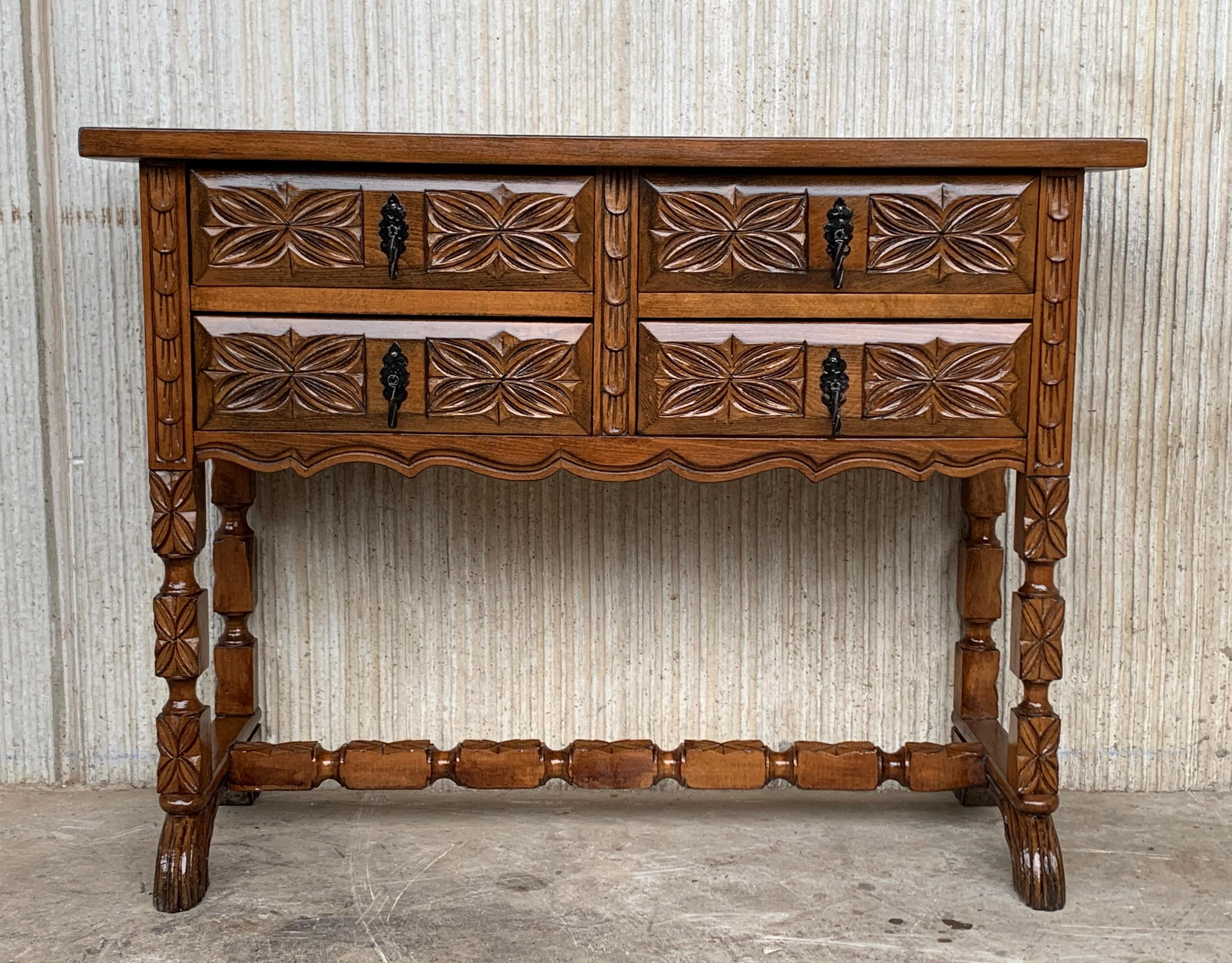 19th century Spanish antique walnut console sofa table with the four drawers and original iron hardware.
You can use like a commode or chest of drawers
This elegant console was crafted in Spain, circa 1890. The sofa table with four legs features a