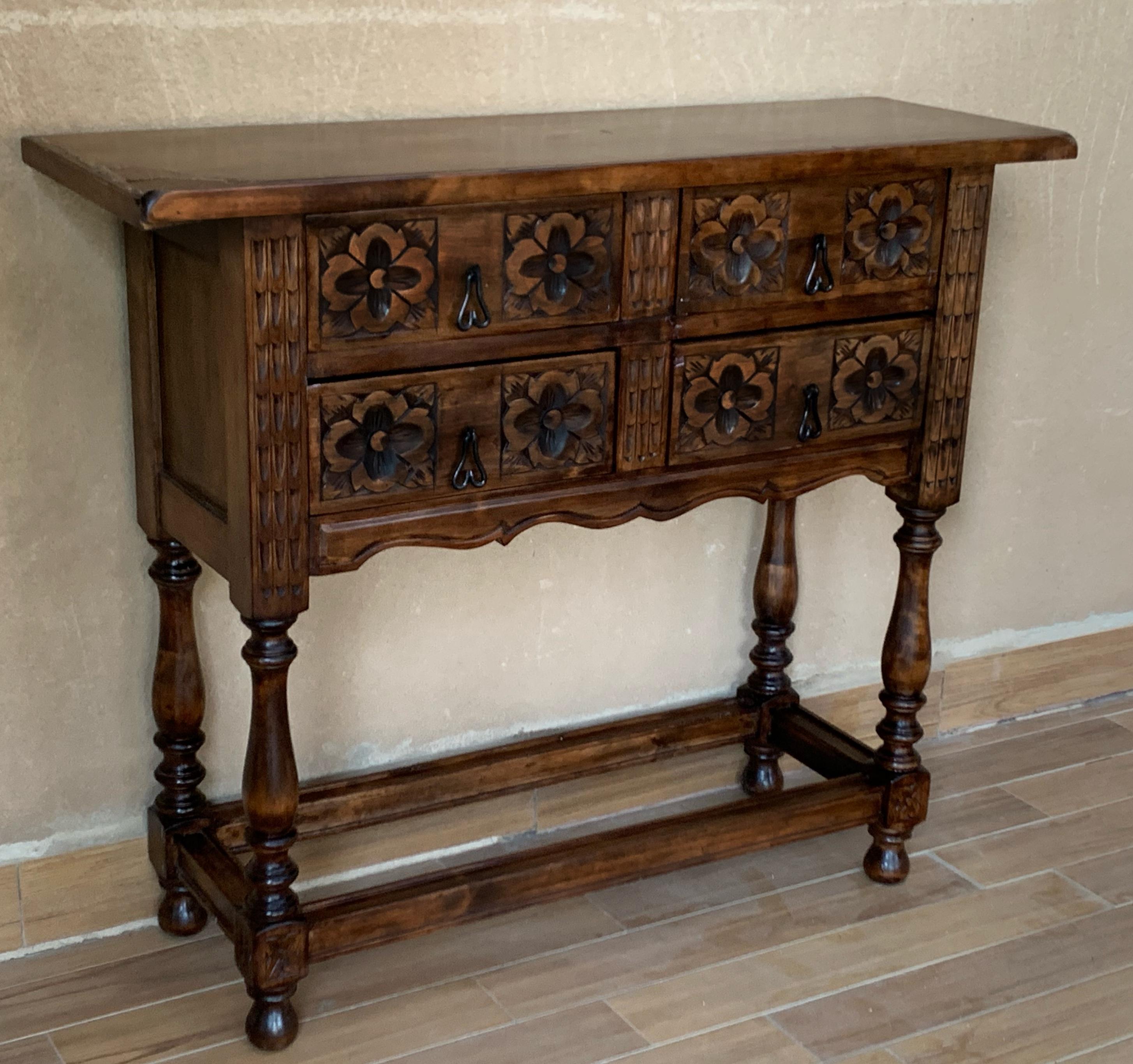 19th century Spanish antique pine walnut console sofa table with the four drawers and original iron hardware.
You can use like a commode or chest of drawers
This elegant console was crafted in Spain, circa 1890. The sofa table with four legs