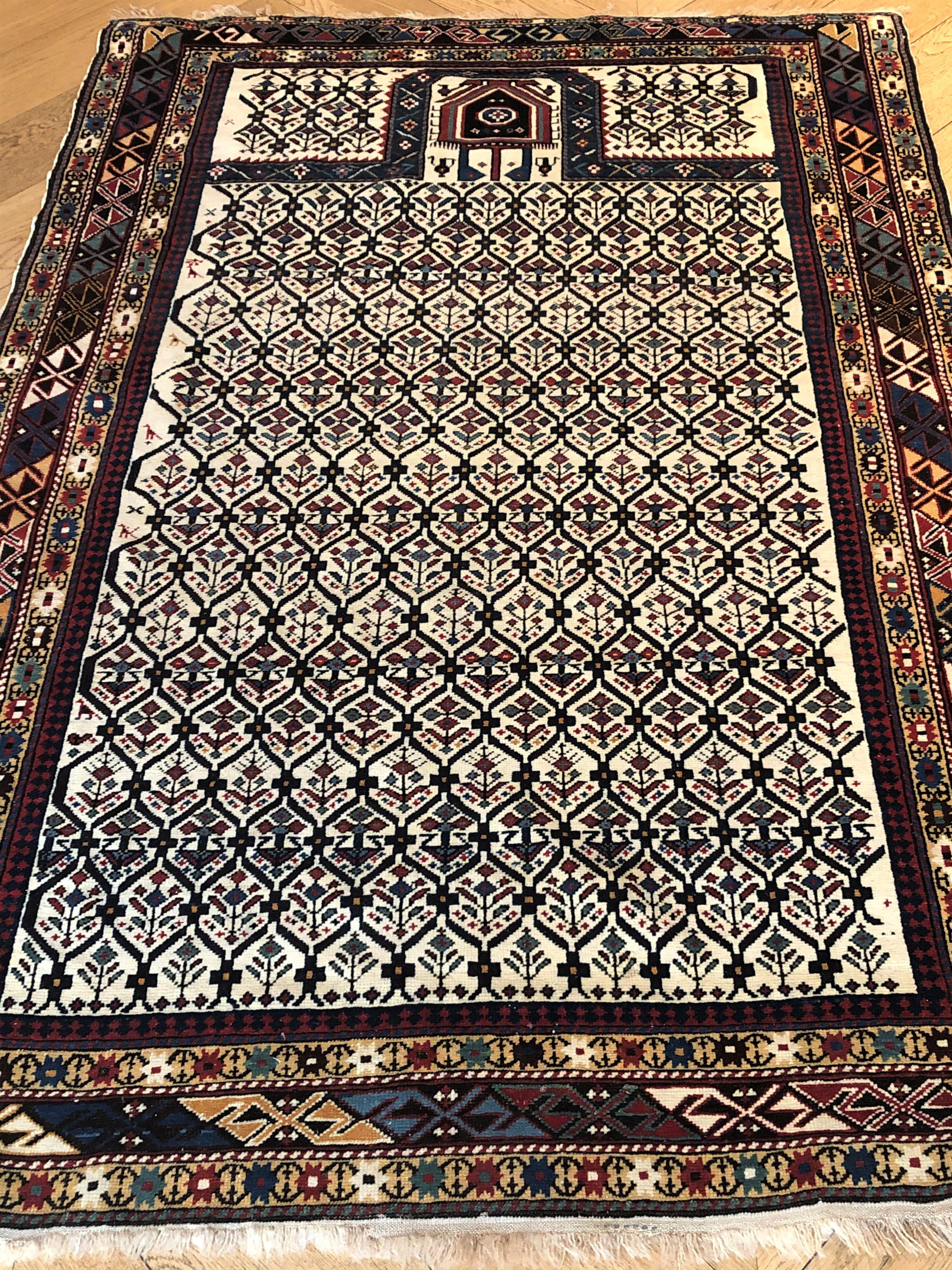 Here’s an antique prayer rug of Caucasian production from Dagestan. Dagestan means 