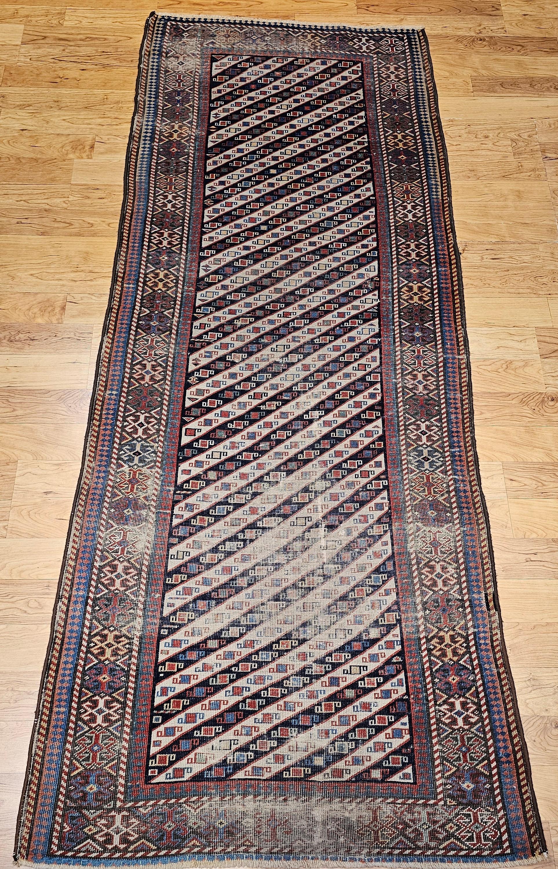 Vegetable Dyed 19th Century Caucasian Gendje Kazak Runner in Navy, Ivory, Red, Yellow, Blue For Sale
