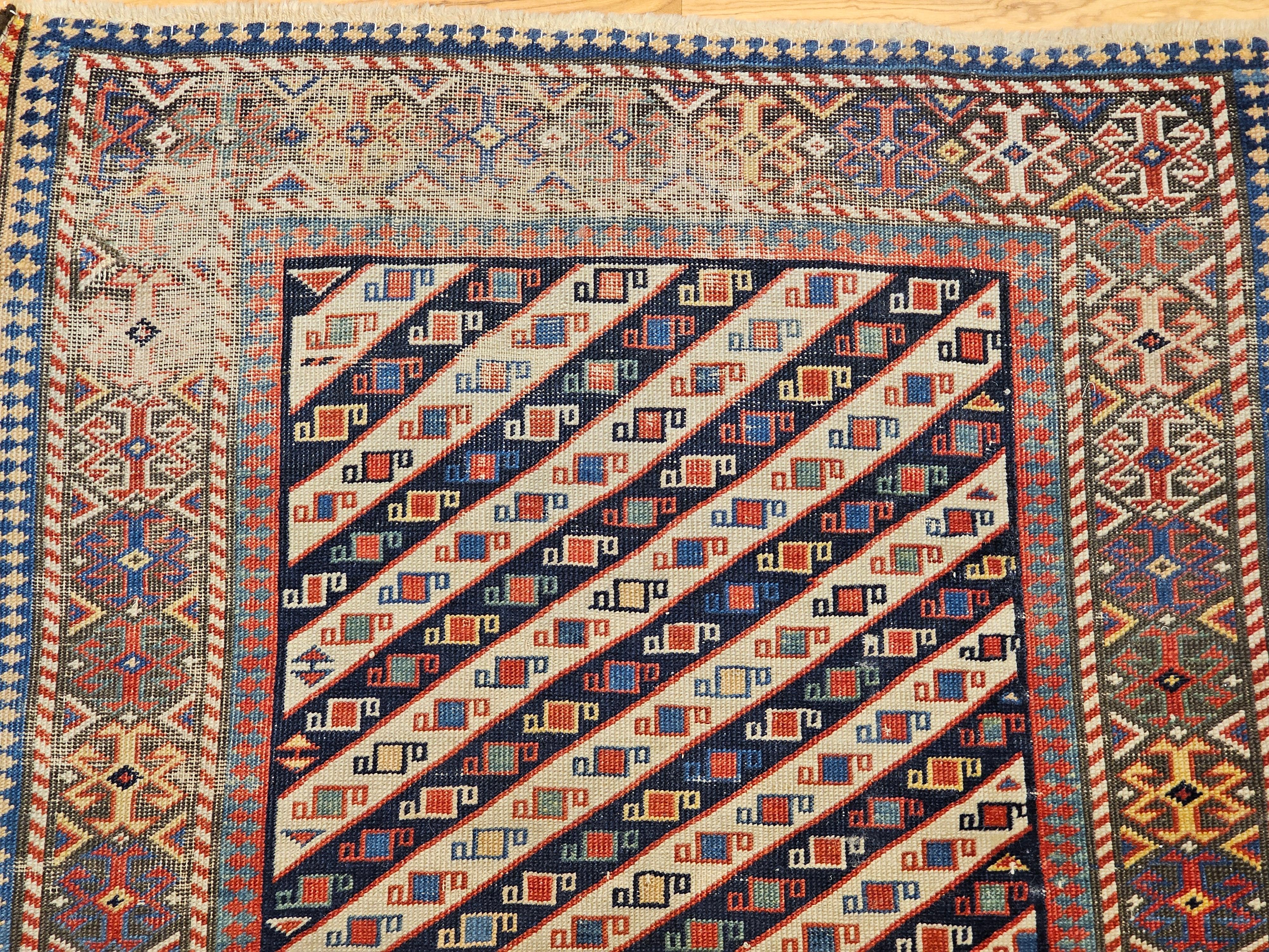 19th Century Caucasian Gendje Kazak Runner in Navy, Ivory, Red, Yellow, Blue In Good Condition For Sale In Barrington, IL