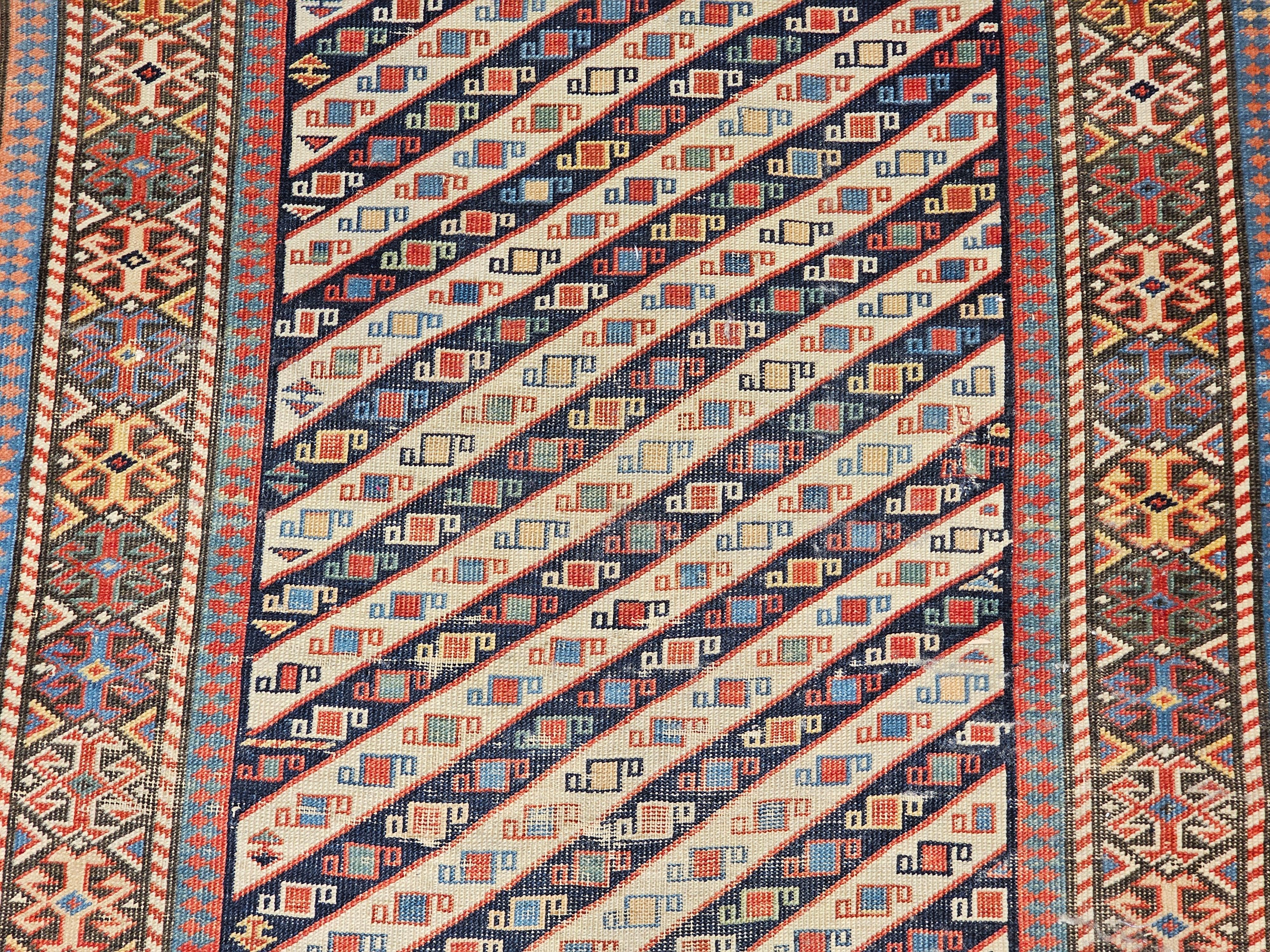 19th Century Caucasian Gendje Kazak Runner in Navy, Ivory, Red, Yellow, Blue