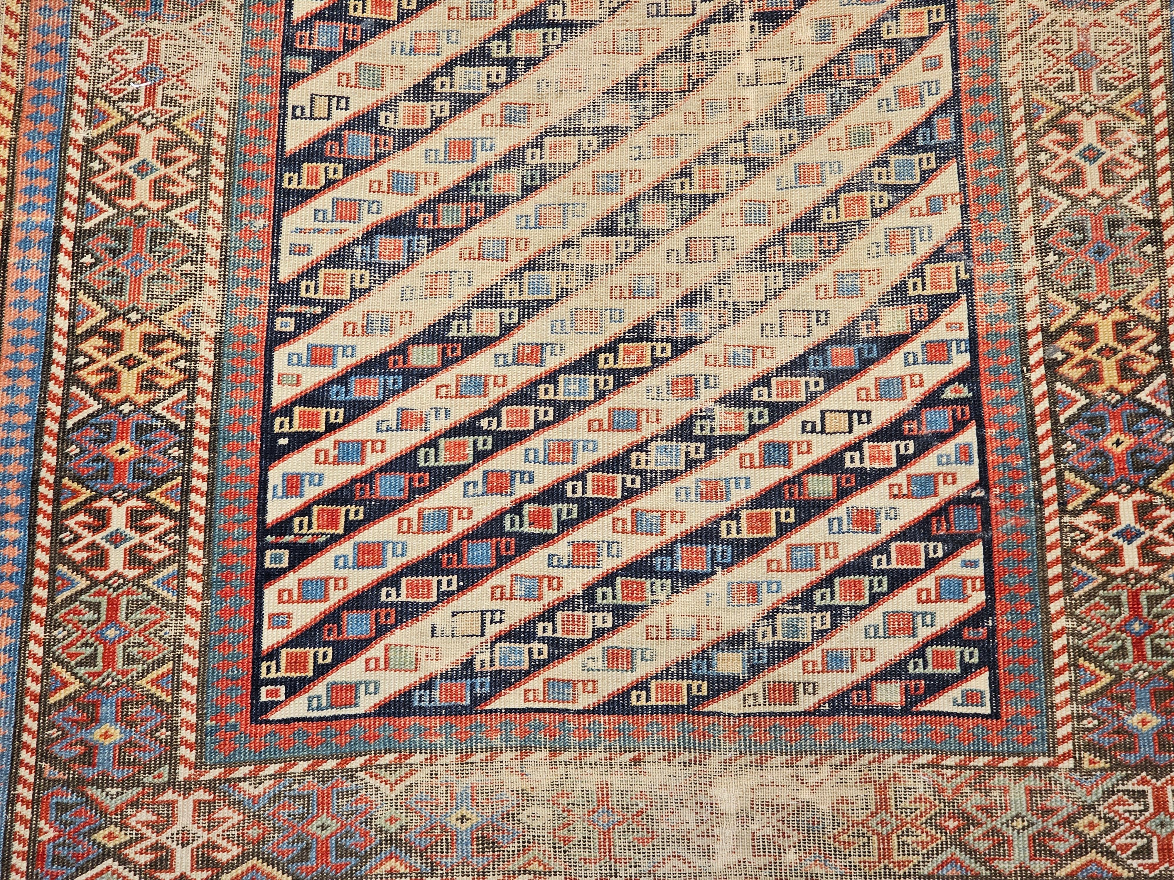 Wool 19th Century Caucasian Gendje Kazak Runner in Navy, Ivory, Red, Yellow, Blue For Sale
