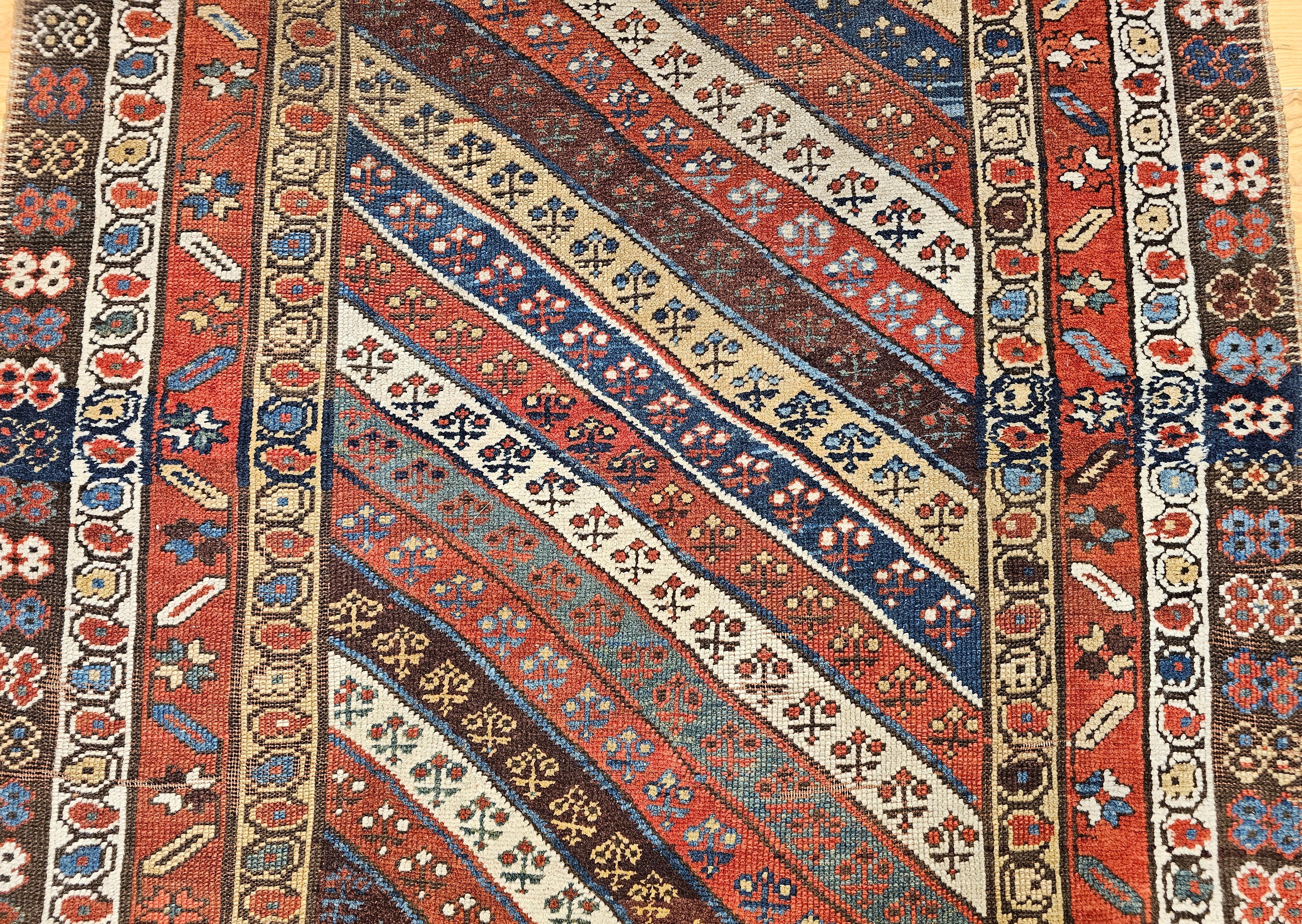 Wool 19th Century Caucasian Gendje Kazak Runner in Navy, Ivory, Red, Yellow, Blue For Sale