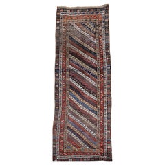 Antique 19th Century Caucasian Gendje Kazak Runner in Navy, Ivory, Red, Yellow, Blue