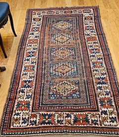 Antique Caucasian Kazak Rug, Handwoven Wool, Memling Gul Medallions