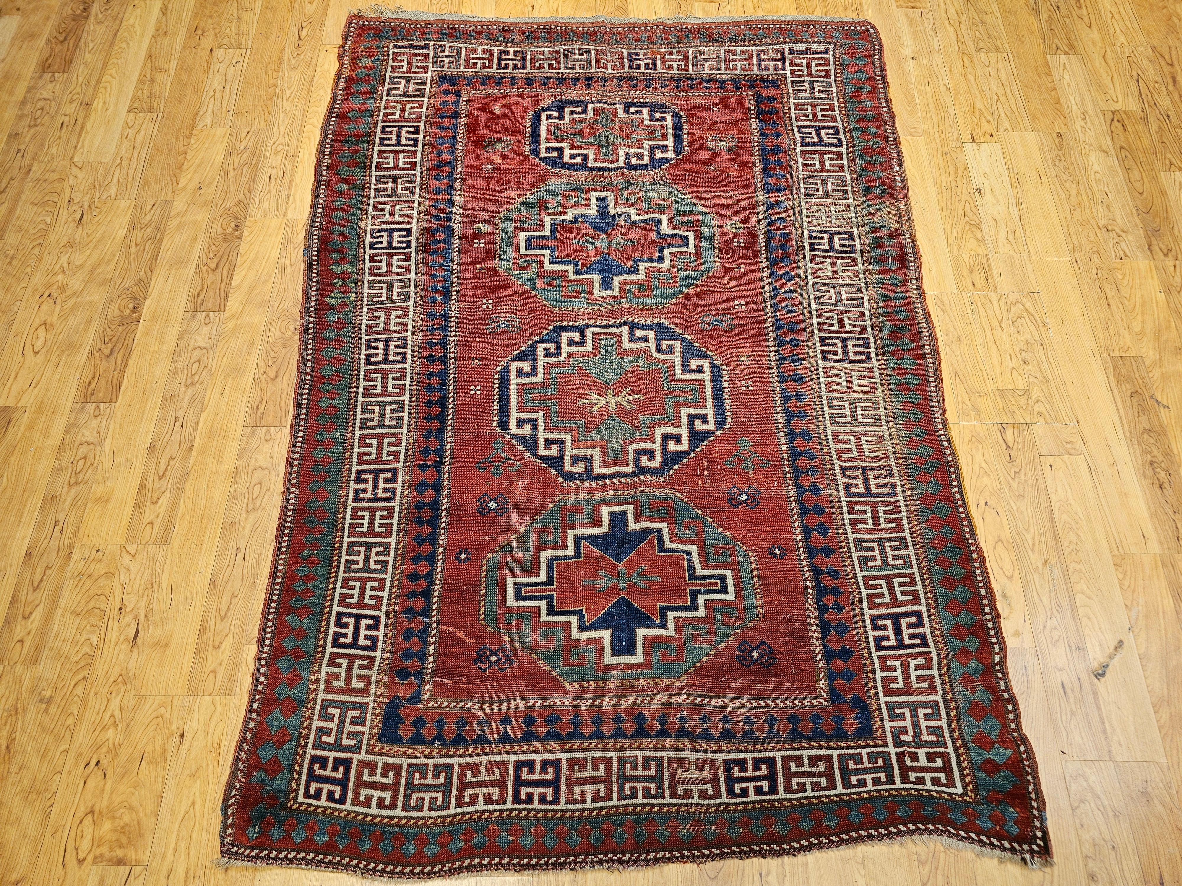 Discover the timeless artistry of the Caucasus with this beautiful Vintage Caucasian Kazak area rug. This exceptional piece features the classic and highly recognizable 