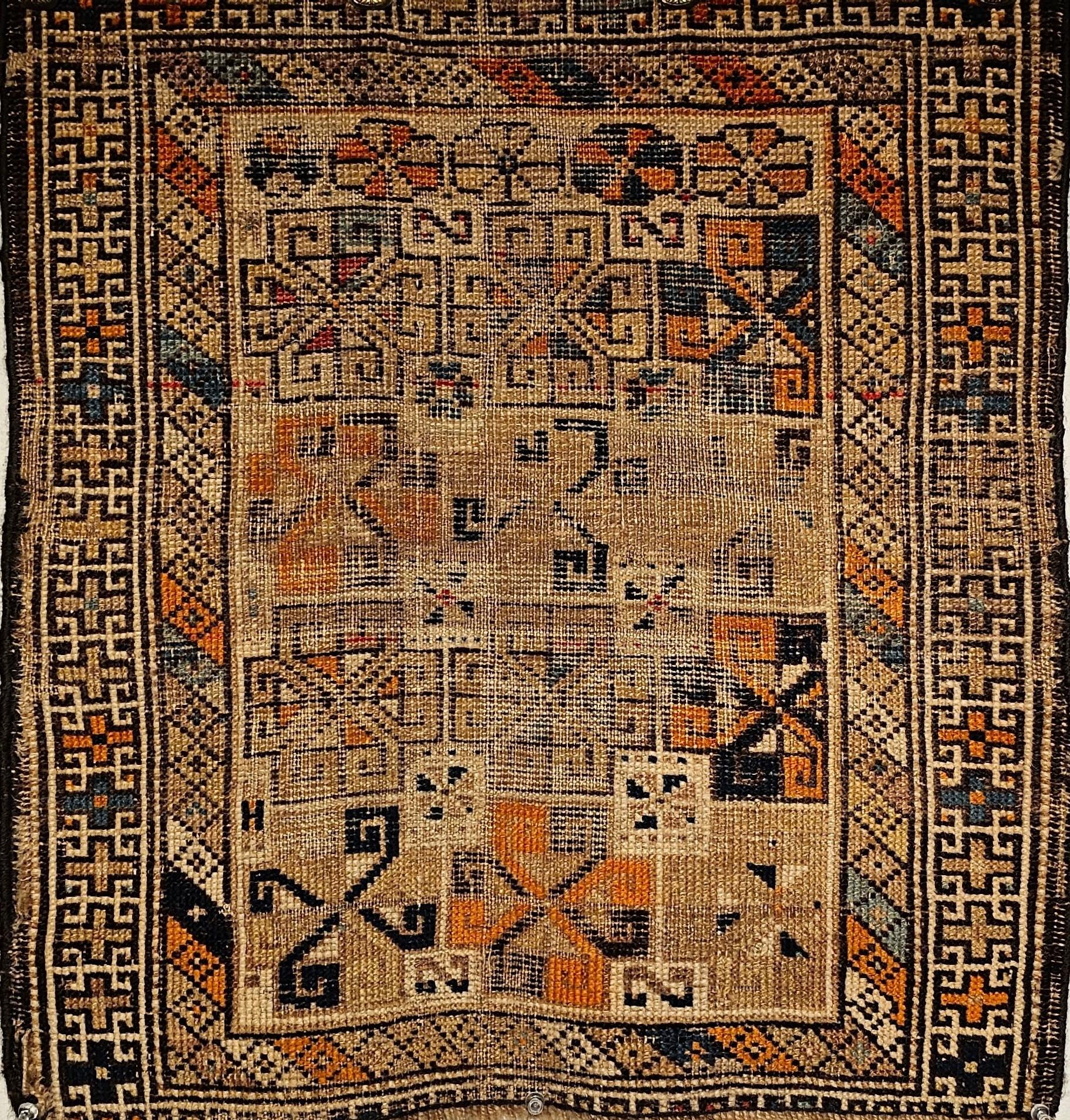  A beautiful Caucasian Kazak bagface from the late 1800s.  The rare small Kazak rug could have been woven to be used as a bagface or a prayer rug.  The freestyle allover design is very appealing.  The combination of small size, design and the colors