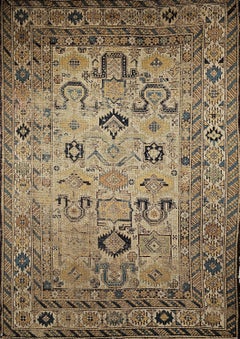 Alfombra caucásica Shirvan del siglo XIX en tonos tostado, azul, azul marino, verde y marrón