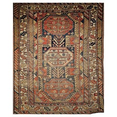 Tappeto Shirvan caucasico del XIX secolo con motivo geometrico in blu e terracotta