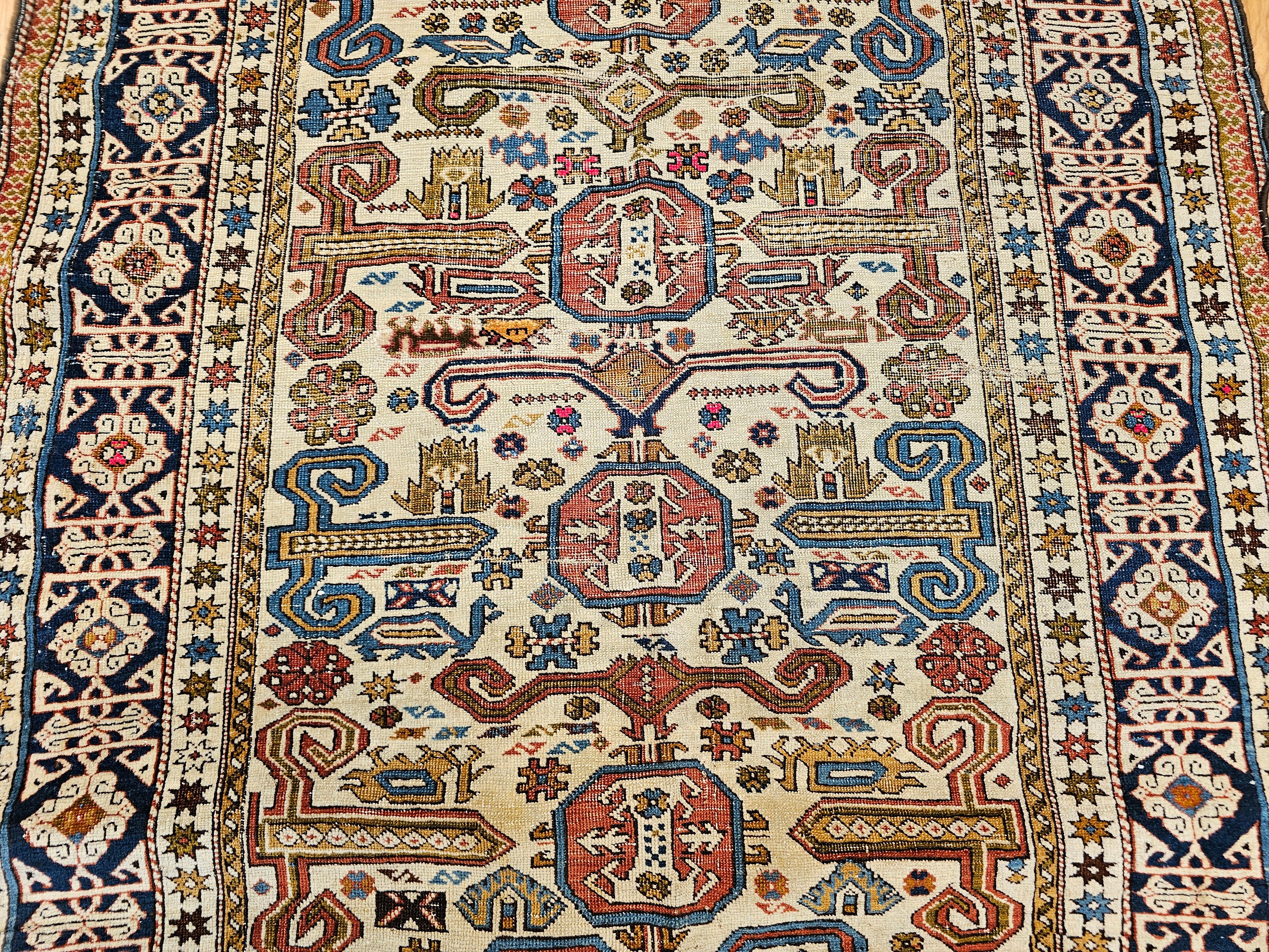 19th Century Caucasian Shirvan Perpedil Area Rug in Ivory, Navy, Brown In Fair Condition For Sale In Barrington, IL