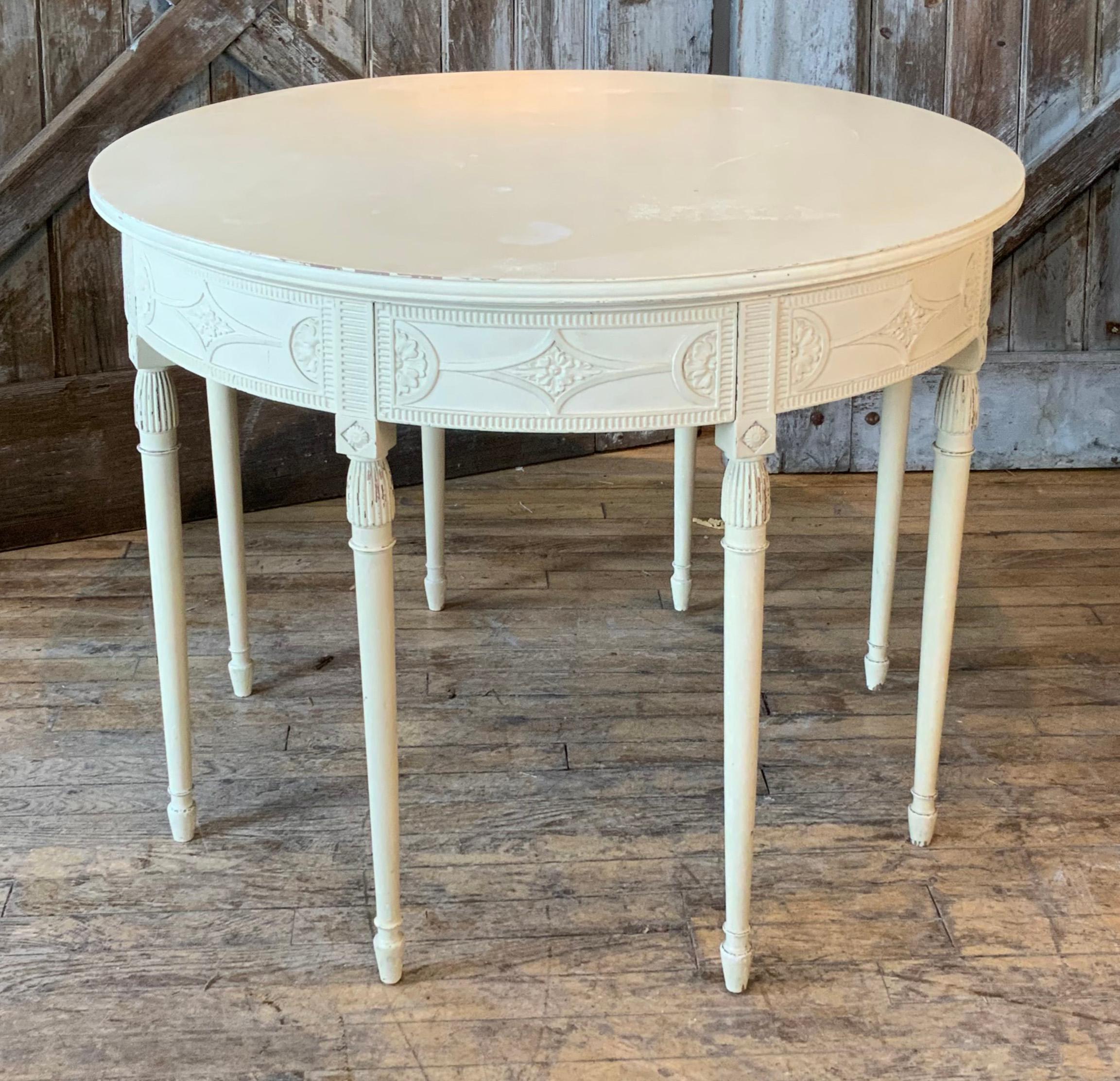 A spectacular late 19th century four drawer round center table designed for the Harold Brown Villa in Newport RI by Ogden Codman, and made by A.H. Davenport. Beautiful scale and with very nicely carved details and patterns, the round table featured