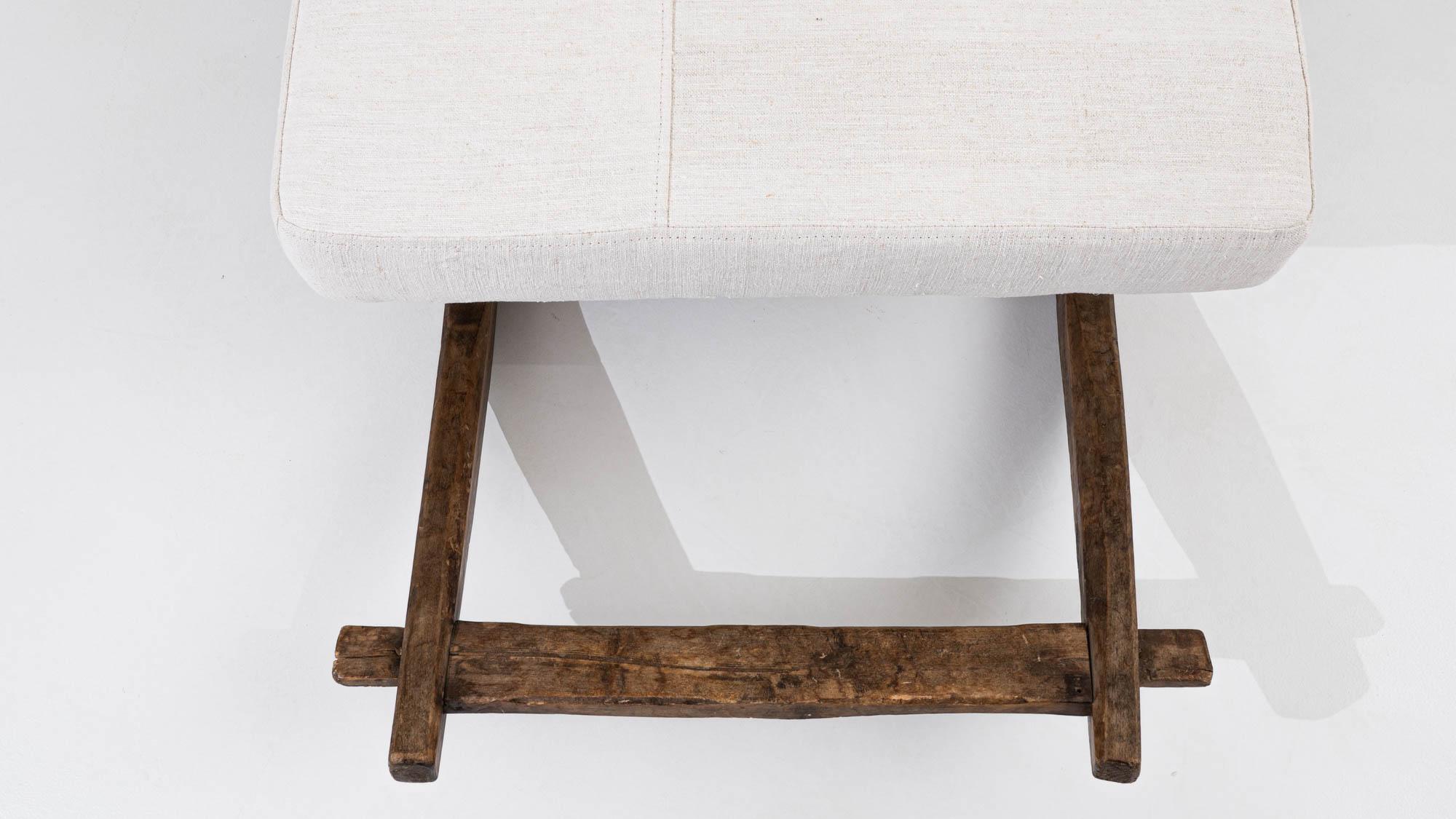 Our Central European 19th Century Wooden Bench, is a timeless piece that seamlessly blends elegance with antique charm. Crafted with precision from durable wood, this bench showcases the exquisite craftsmanship of a bygone era. The warm, rich wood
