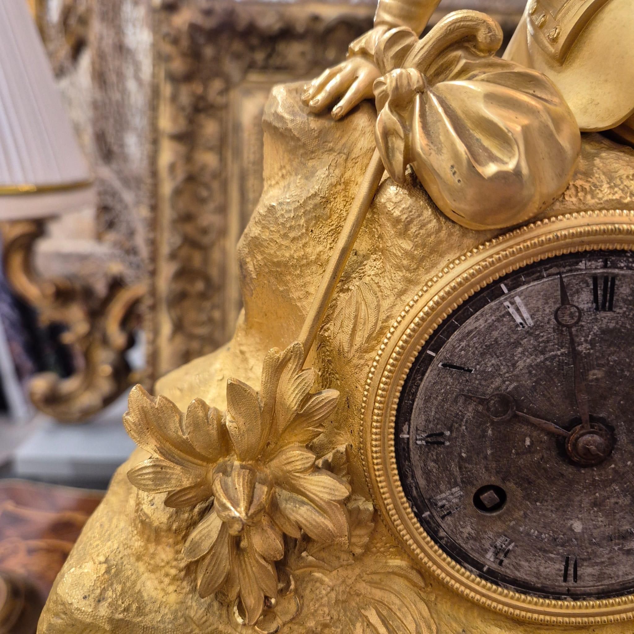 French 19th Century Charles X Clock with a Statue of a Romantic Young Nobleman. For Sale