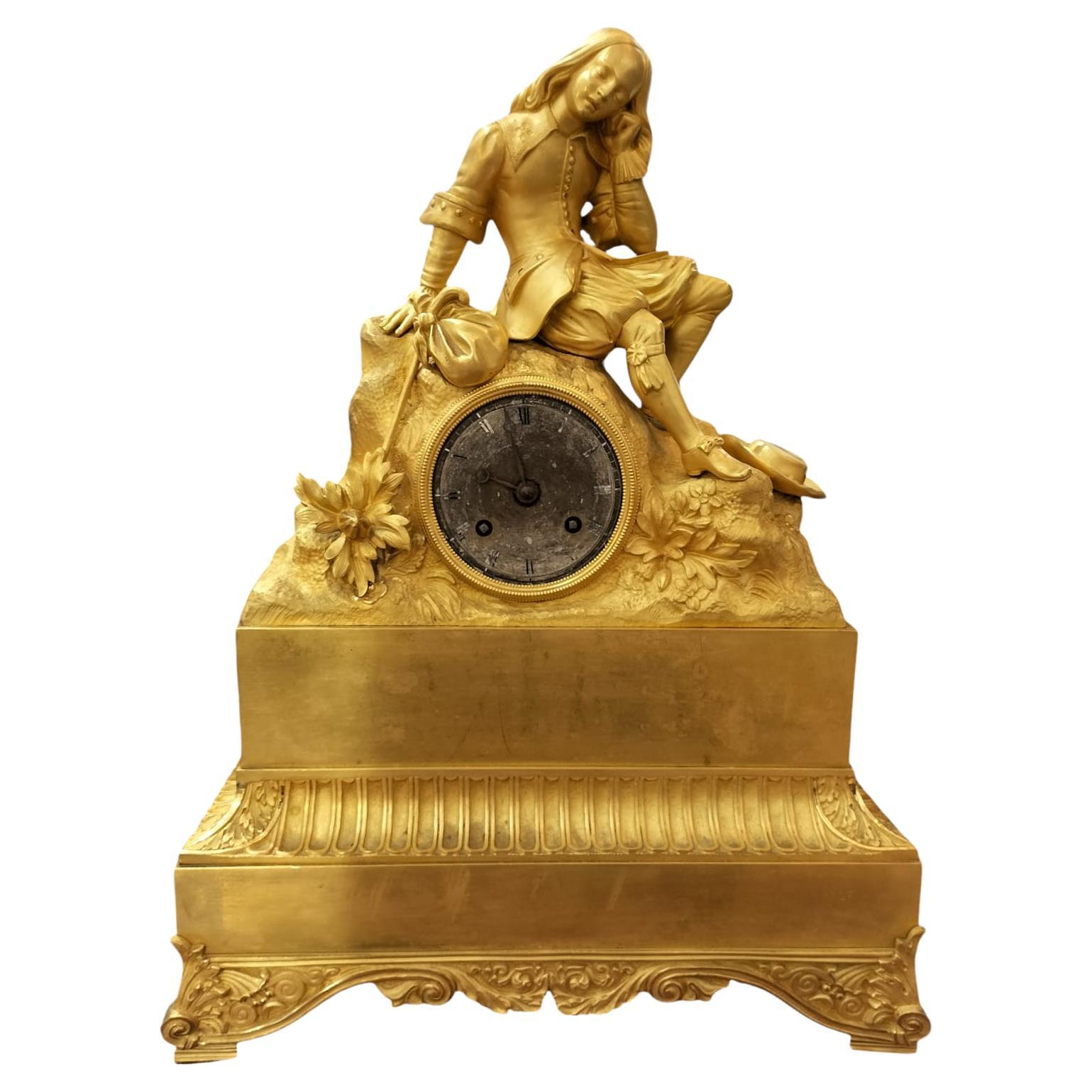 19th Century Charles X Clock with a Statue of a Romantic Young Nobleman.