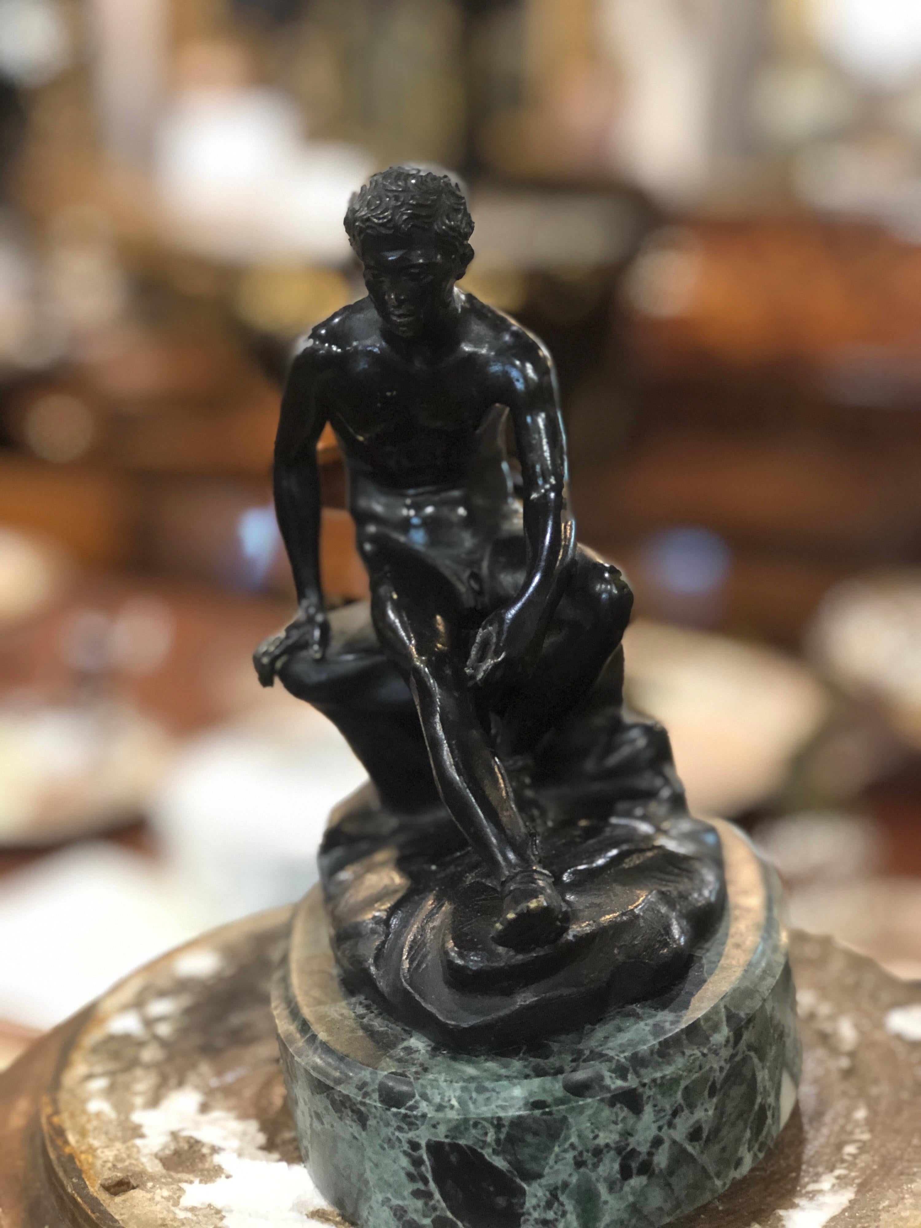 A Gran Tour bronze 'Seated Hermes' or Mercury of 1830 circa, with marble base.