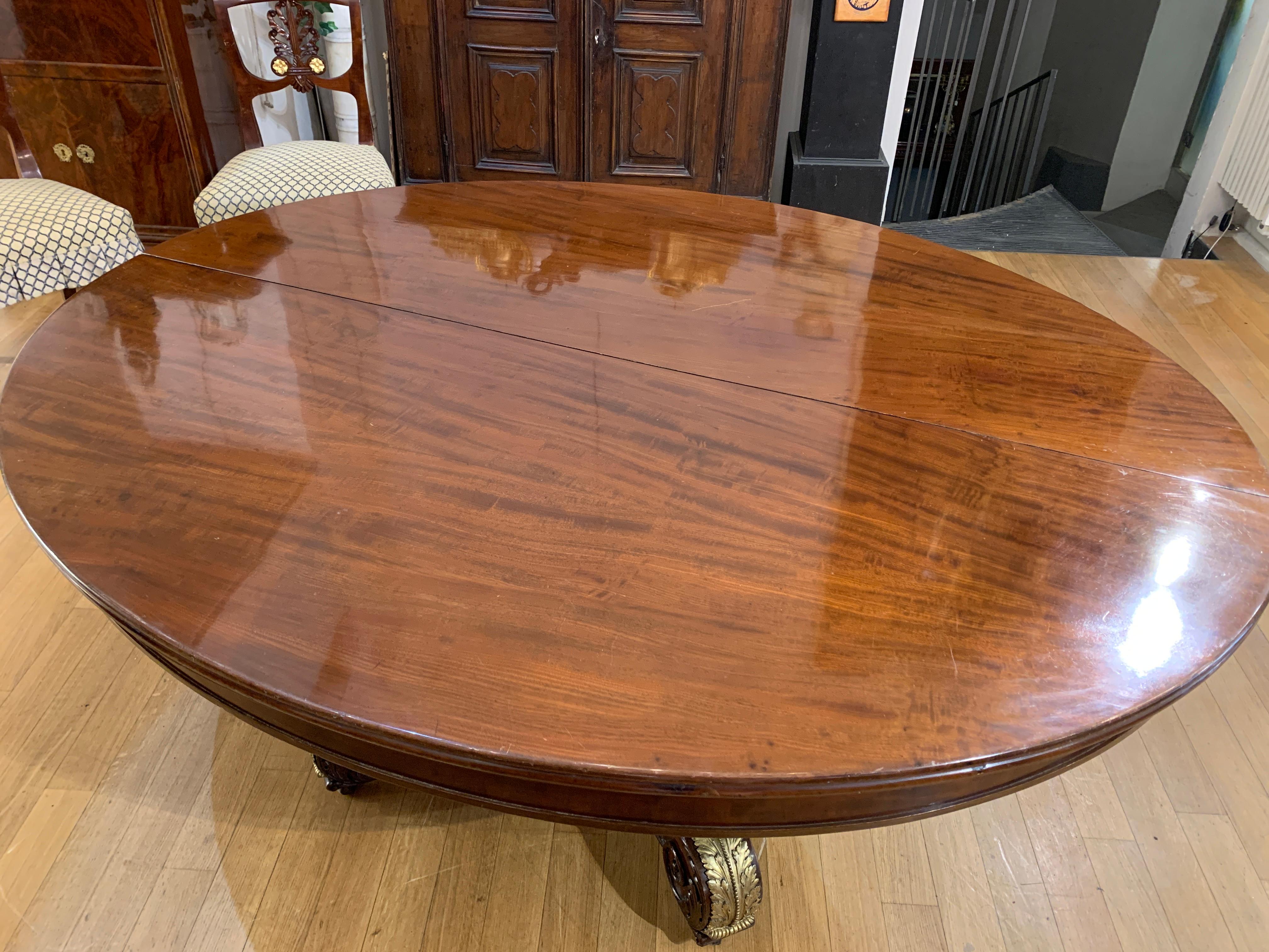 Gilt 19th CENTURY CHARLES X OVAL TABLE IN SOLID MAHOGANY  For Sale