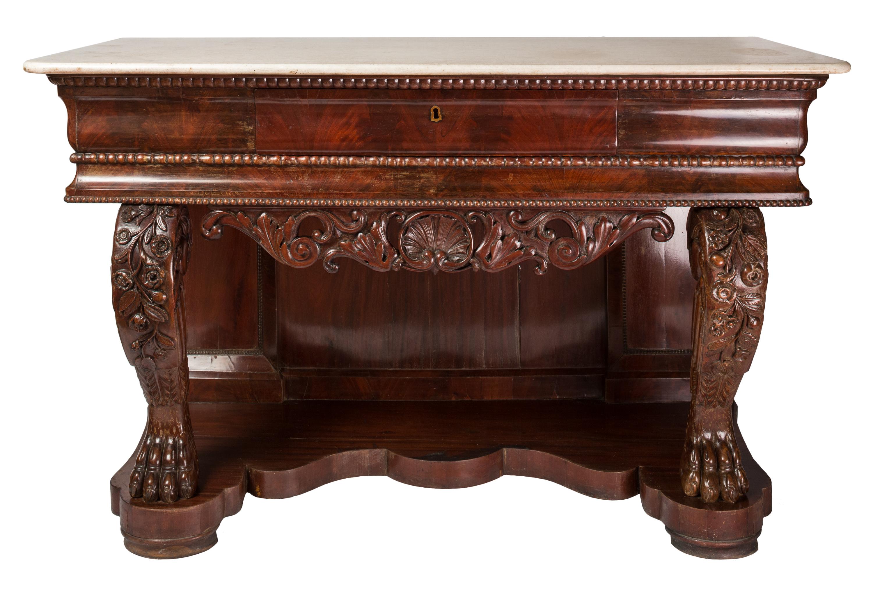 19th Century French Charles X style hardwood console table, with rectangular white marble top over a conforming frieze with single locking drawer, raised on muscular scrolled cabriole legs ending in claw feet standing on an undulate base. The